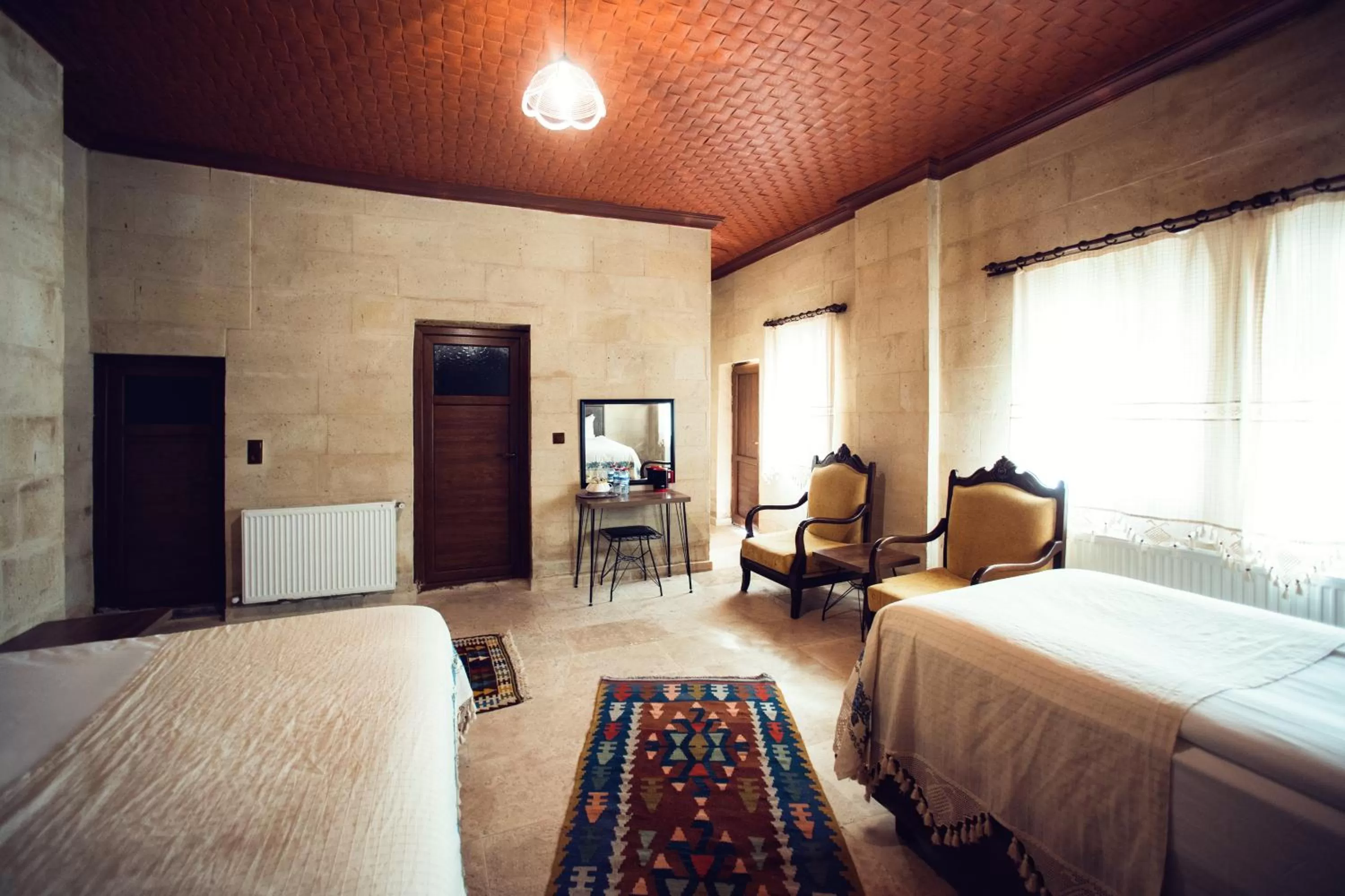 Bed in Azalea Terrace Cave Hotel