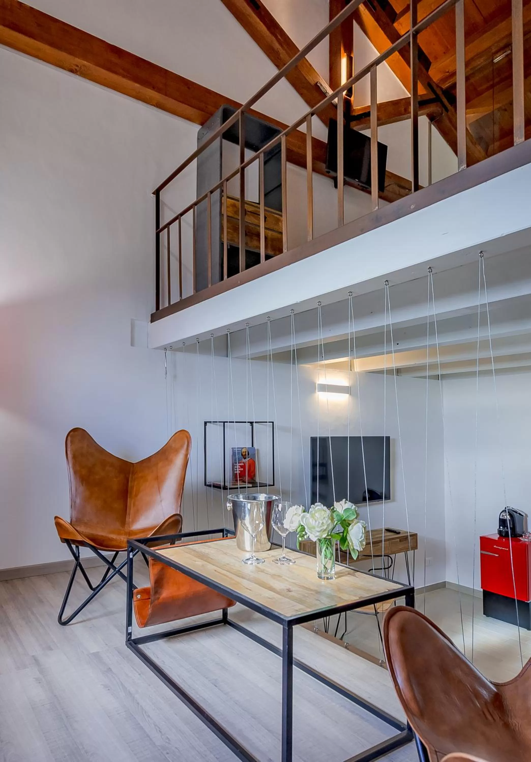 Bed in Le Maestranze Deluxe Rooms