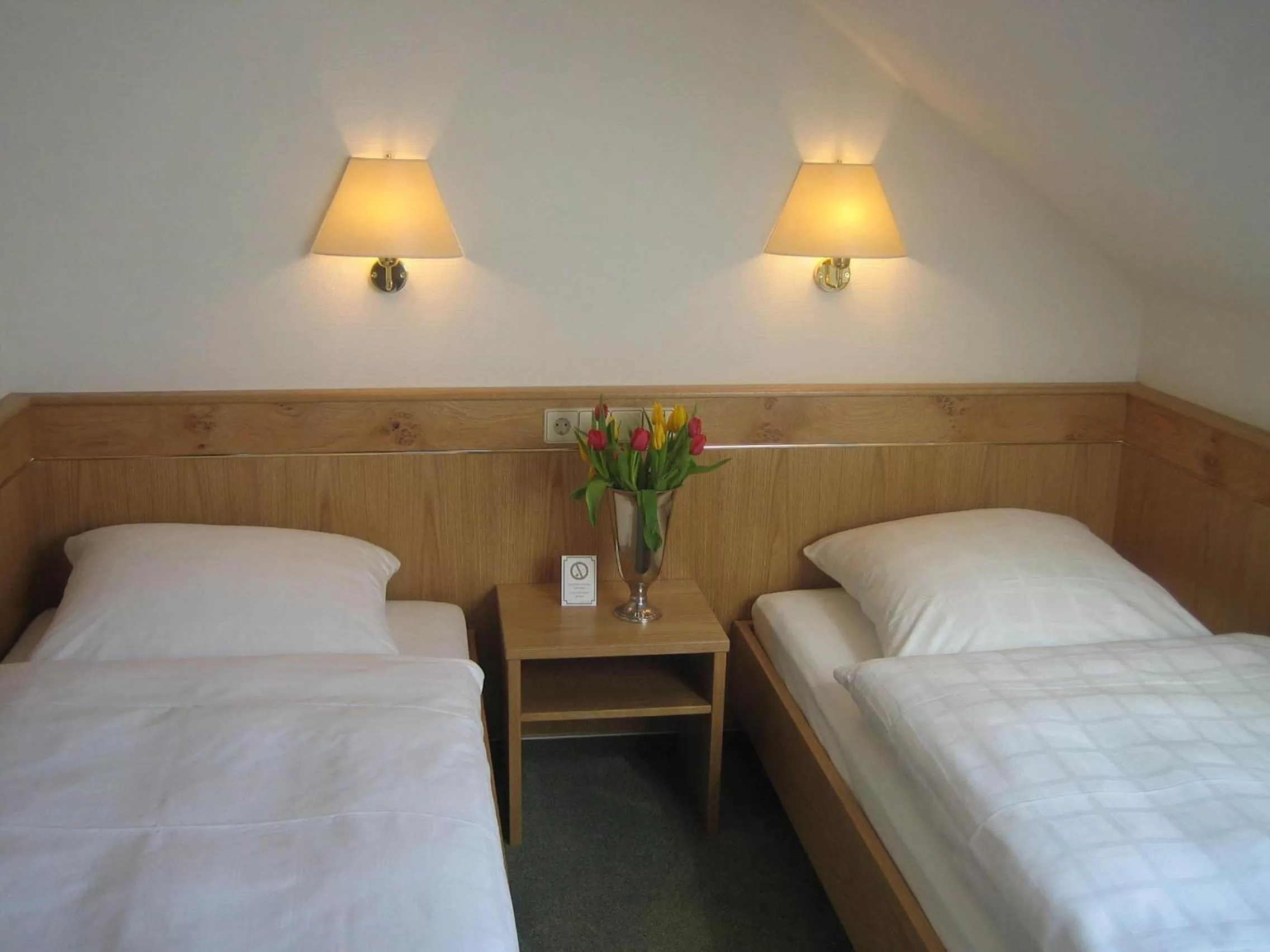 Decorative detail, Bed in Hotel Württemberger Hof Garni