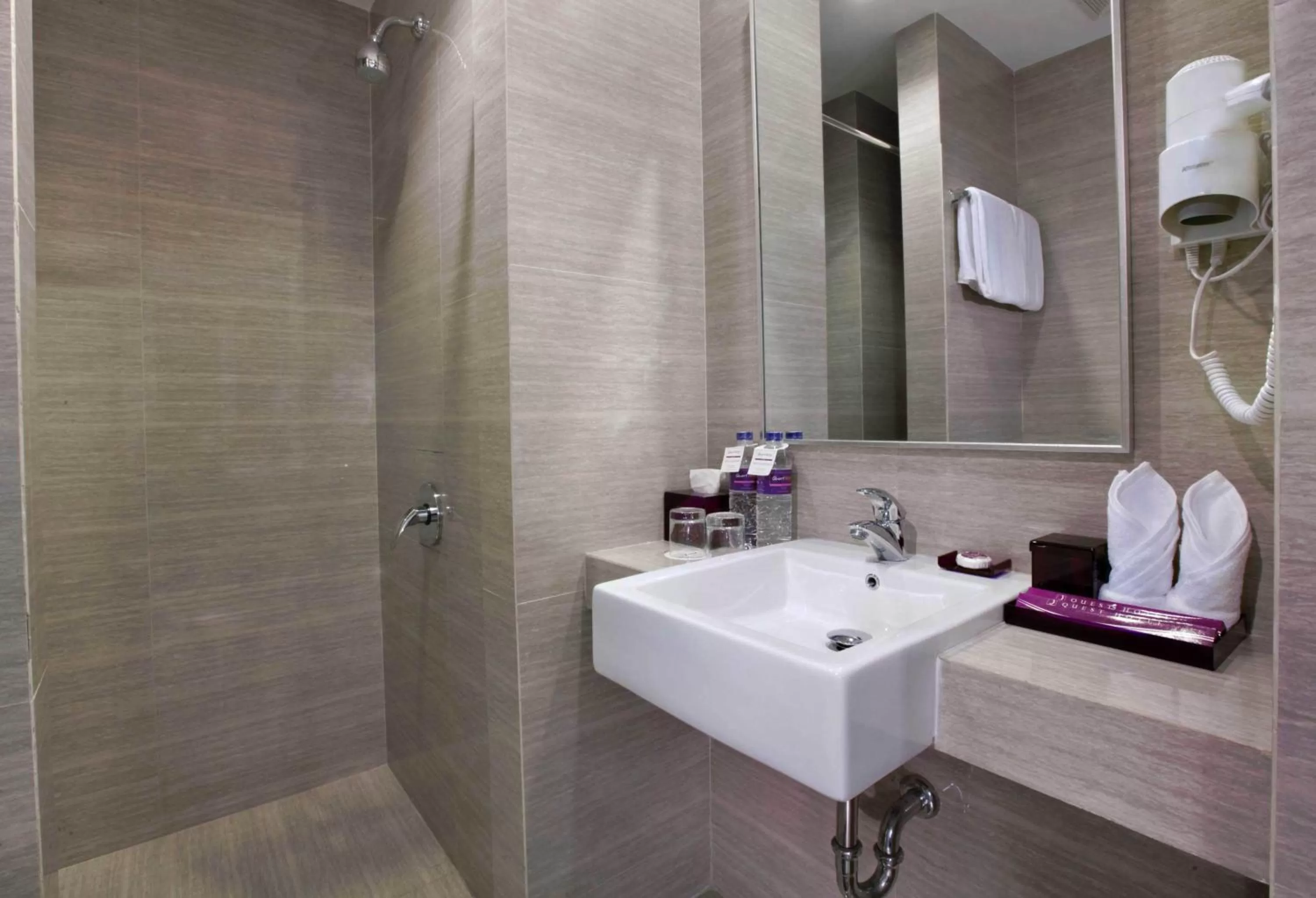 Shower in Quest Hotel Balikpapan by ASTON