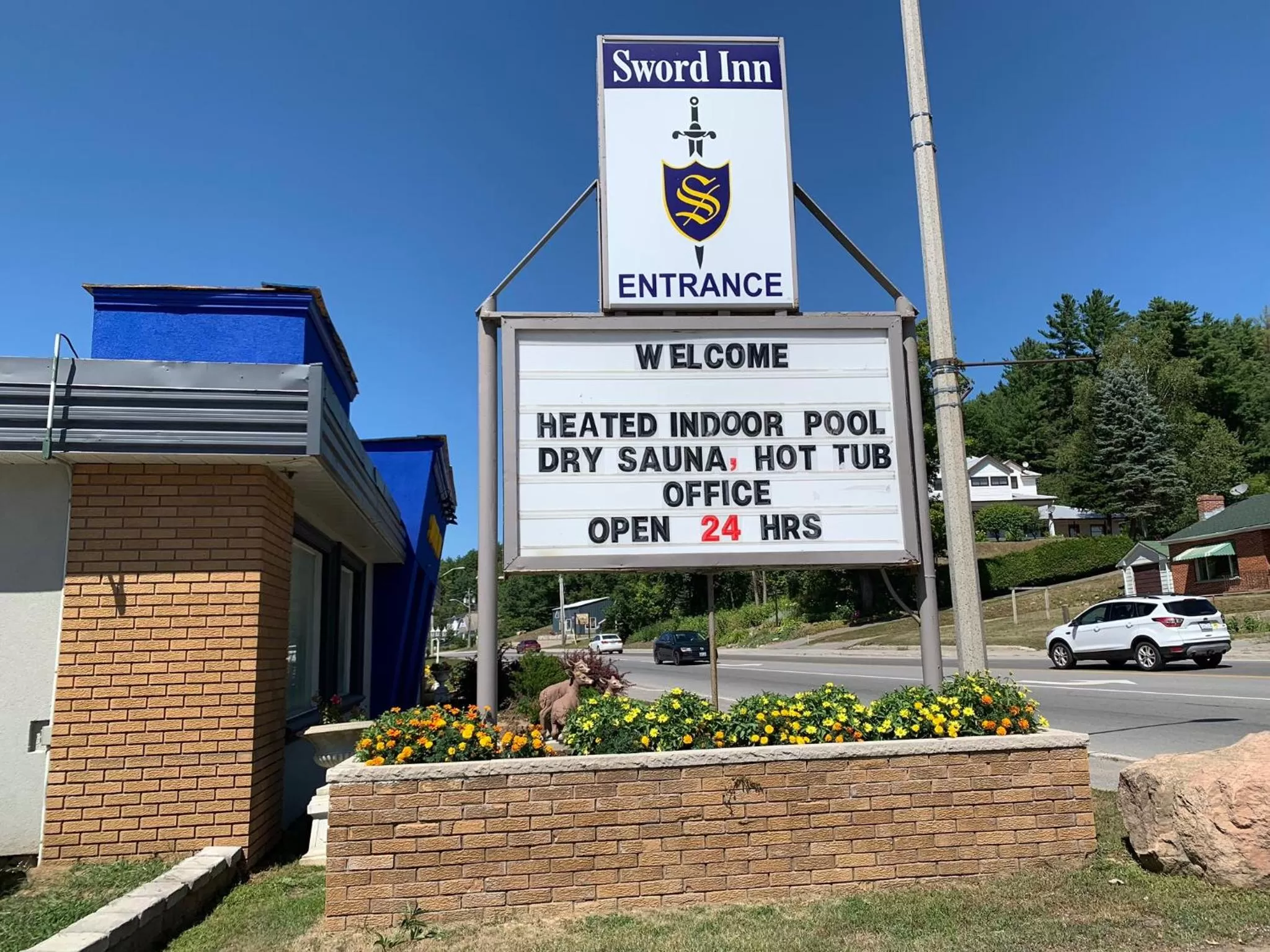 Property logo or sign in Sword Inn Bancroft