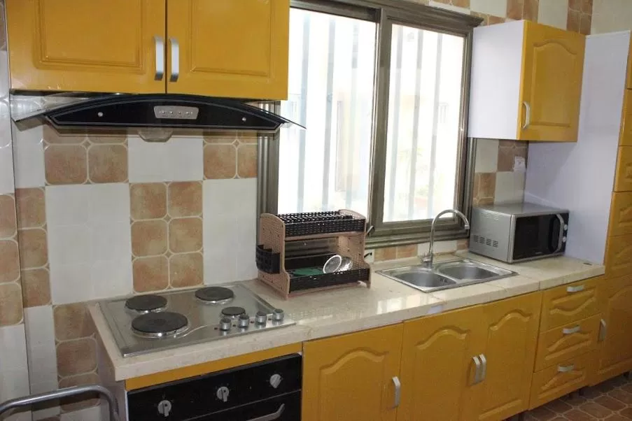 Kitchen or kitchenette in Résidence RoseKane