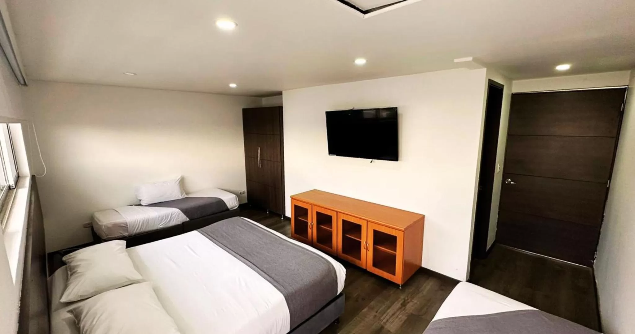 Bed in Hotel Expo Hotel Ferial