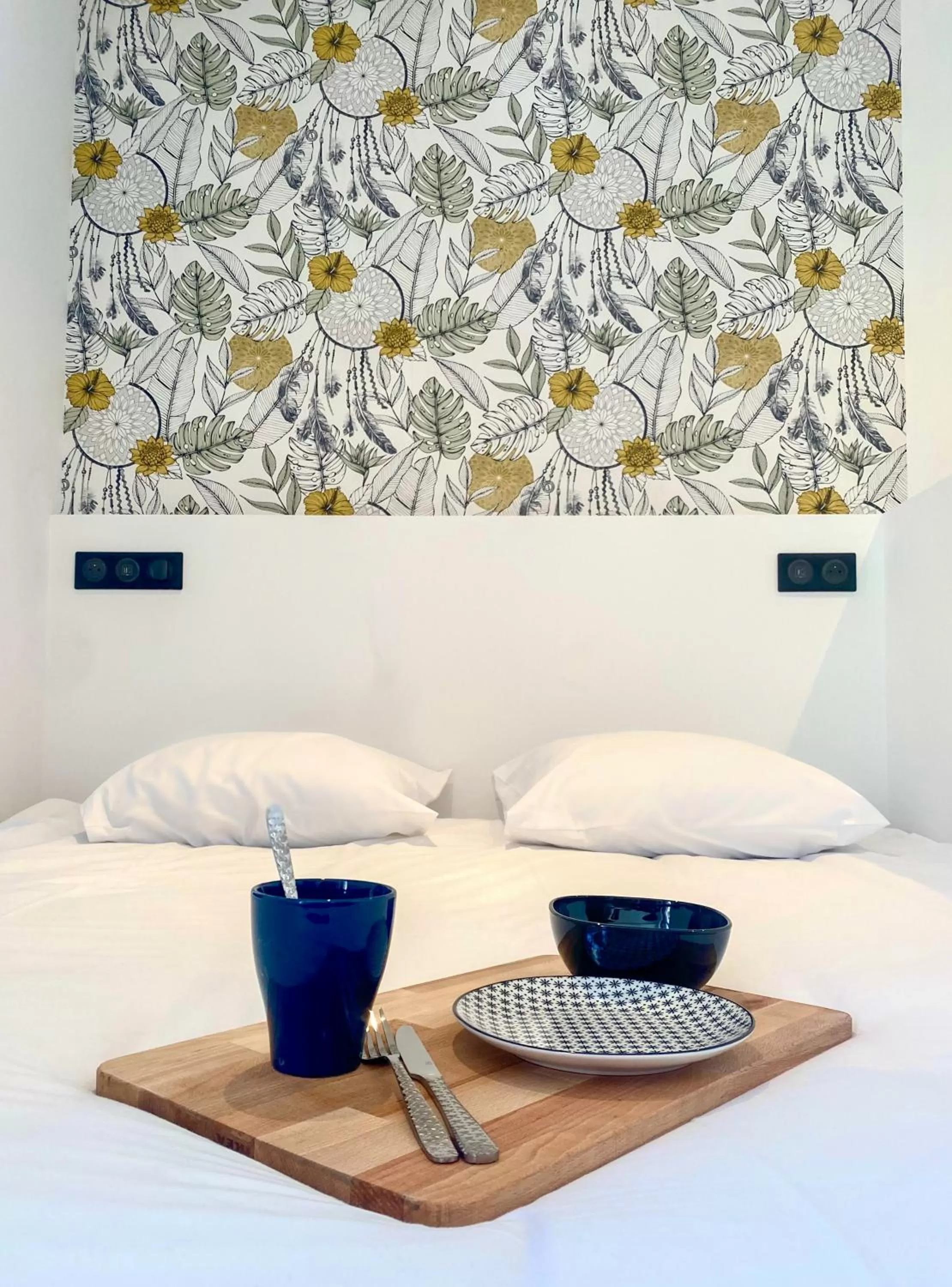 Bed in Le Bras d'or Apparts et Spa