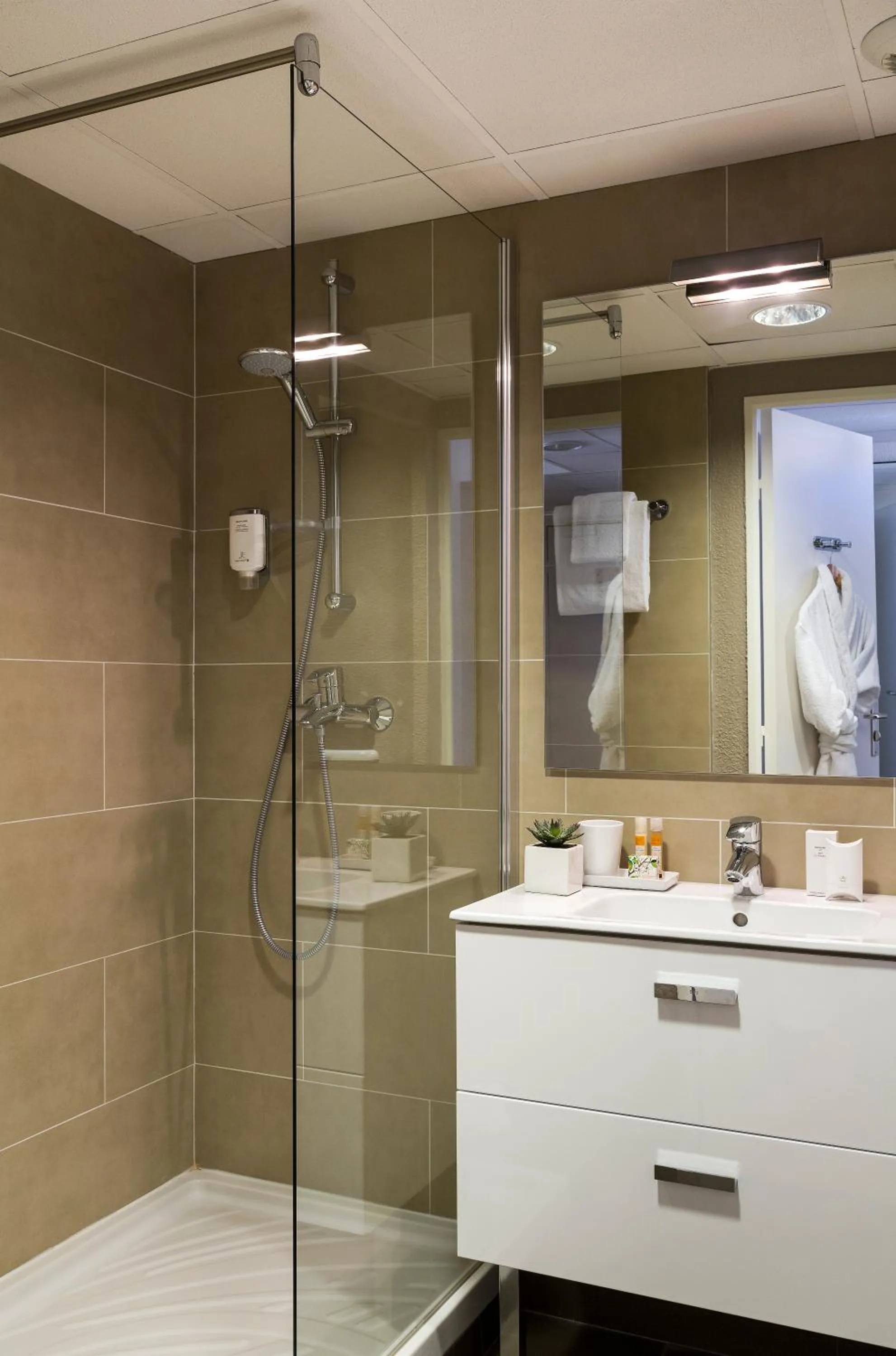 Bathroom in Citadines Croisette Cannes