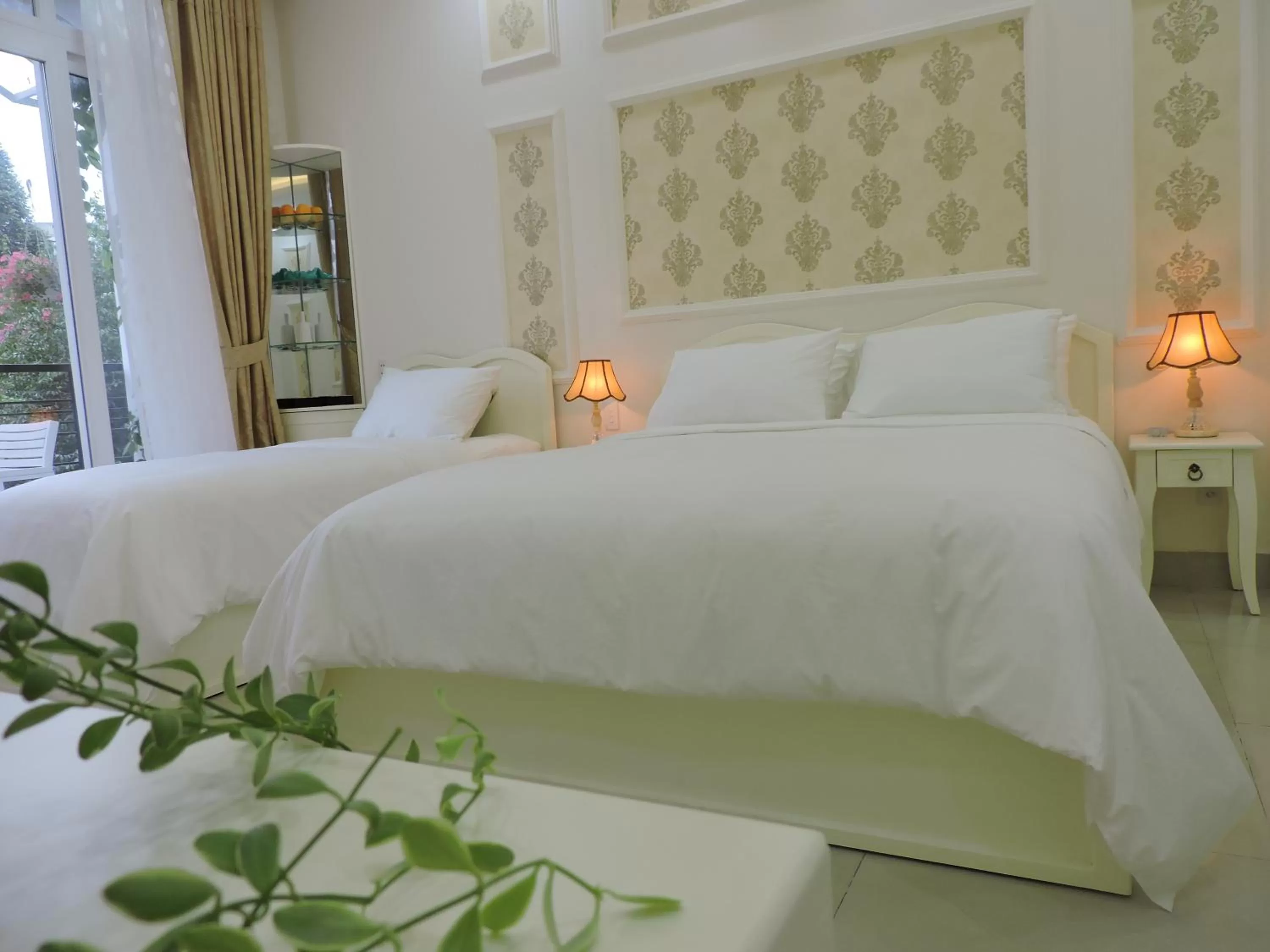 Bed in Chez Lotus Rose