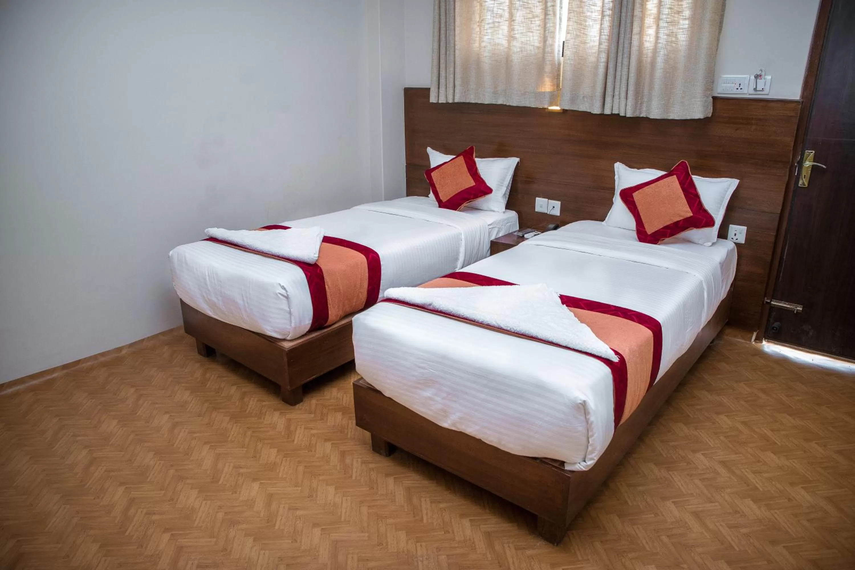 Bed in Hotel Himalayan Vacation