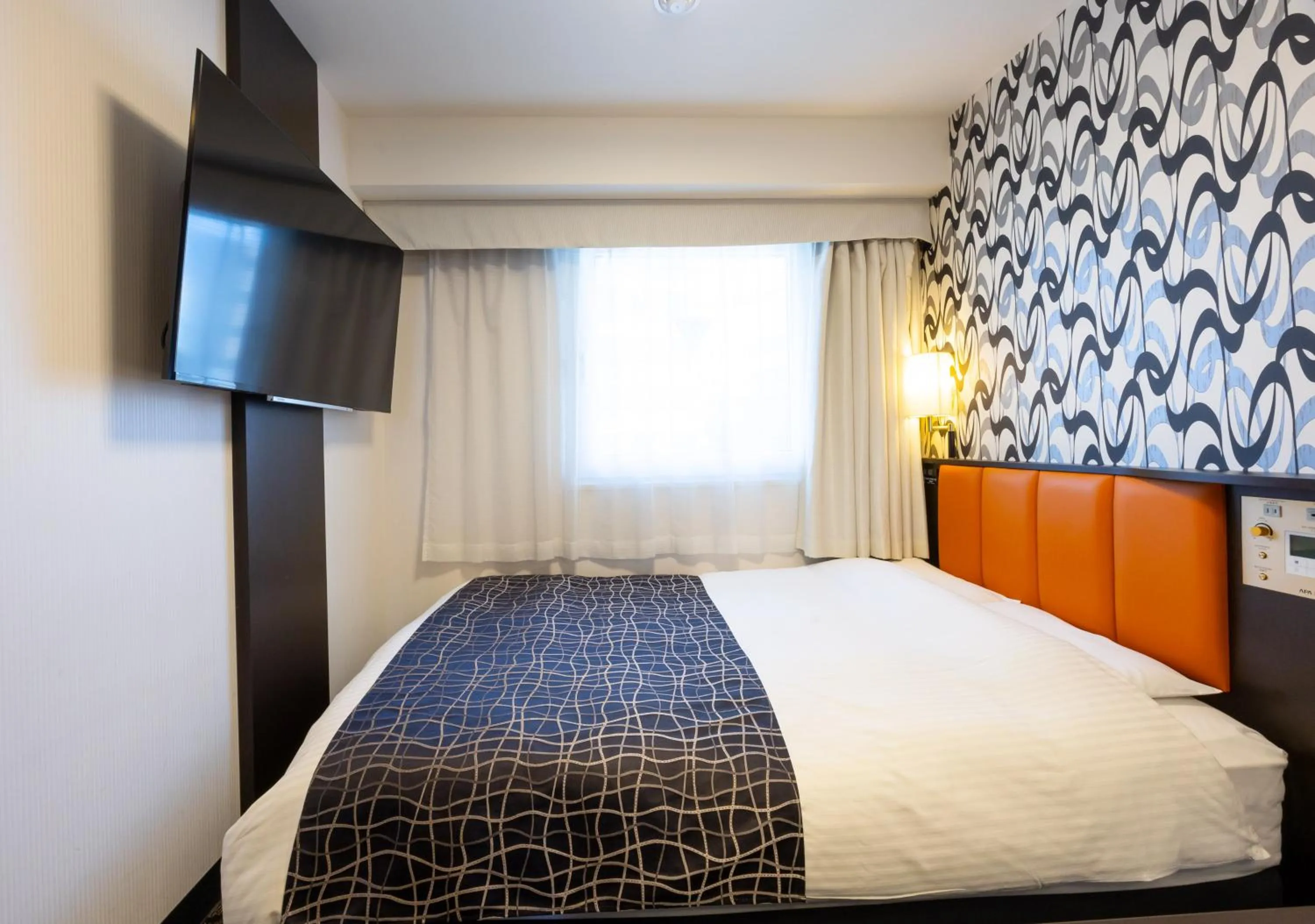Bed in APA Hotel Osaka Umeda