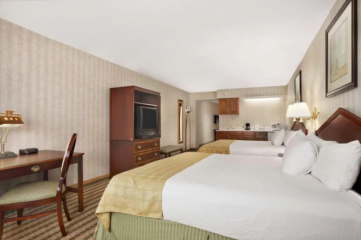Photo of the whole room, Bed in Ramada by Wyndham Saginaw Hotel & Suites