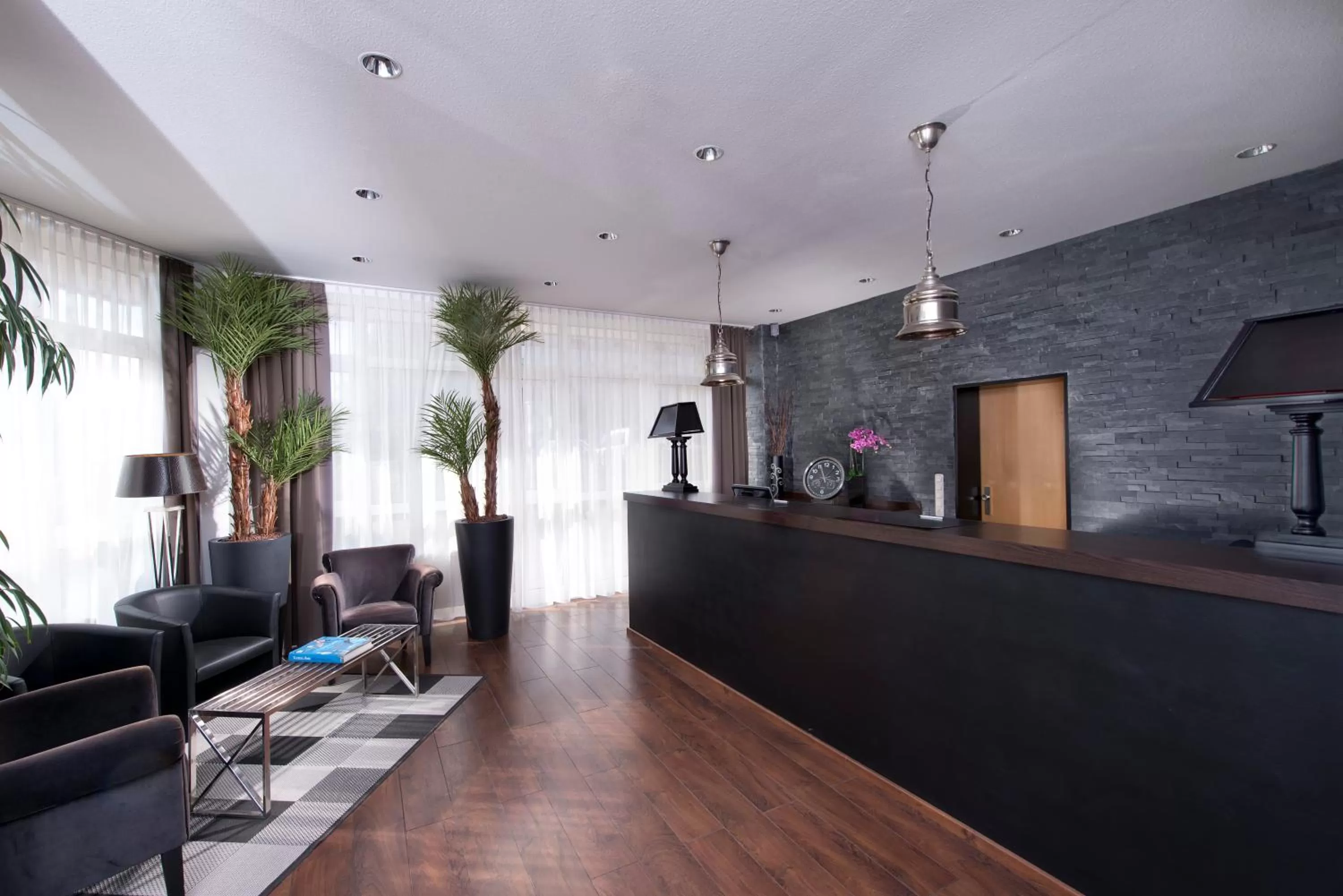 Lobby or reception in Tryp by Wyndham Luebeck Aquamarin