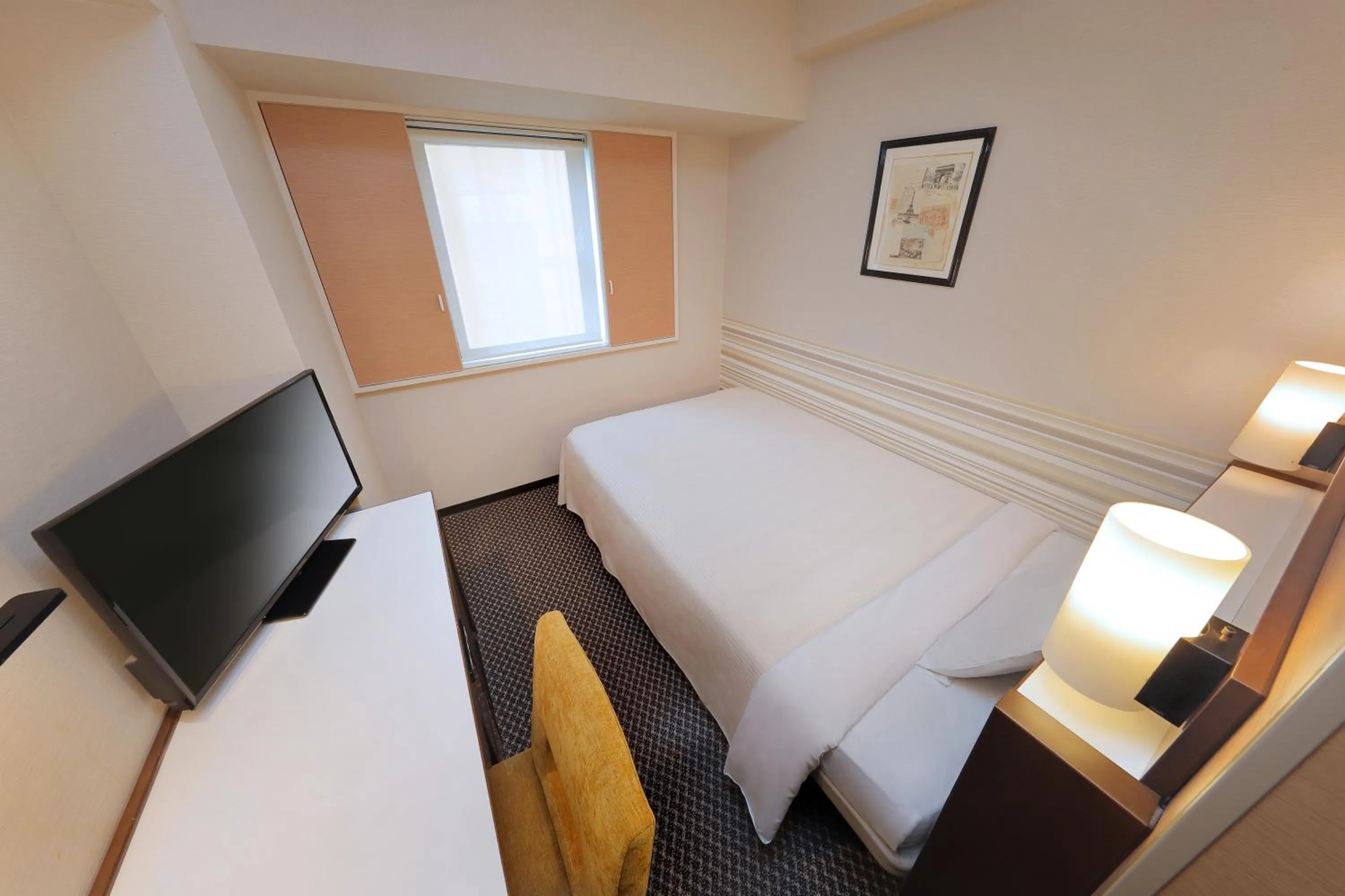 Bed in Keio Presso Inn Shinjuku
