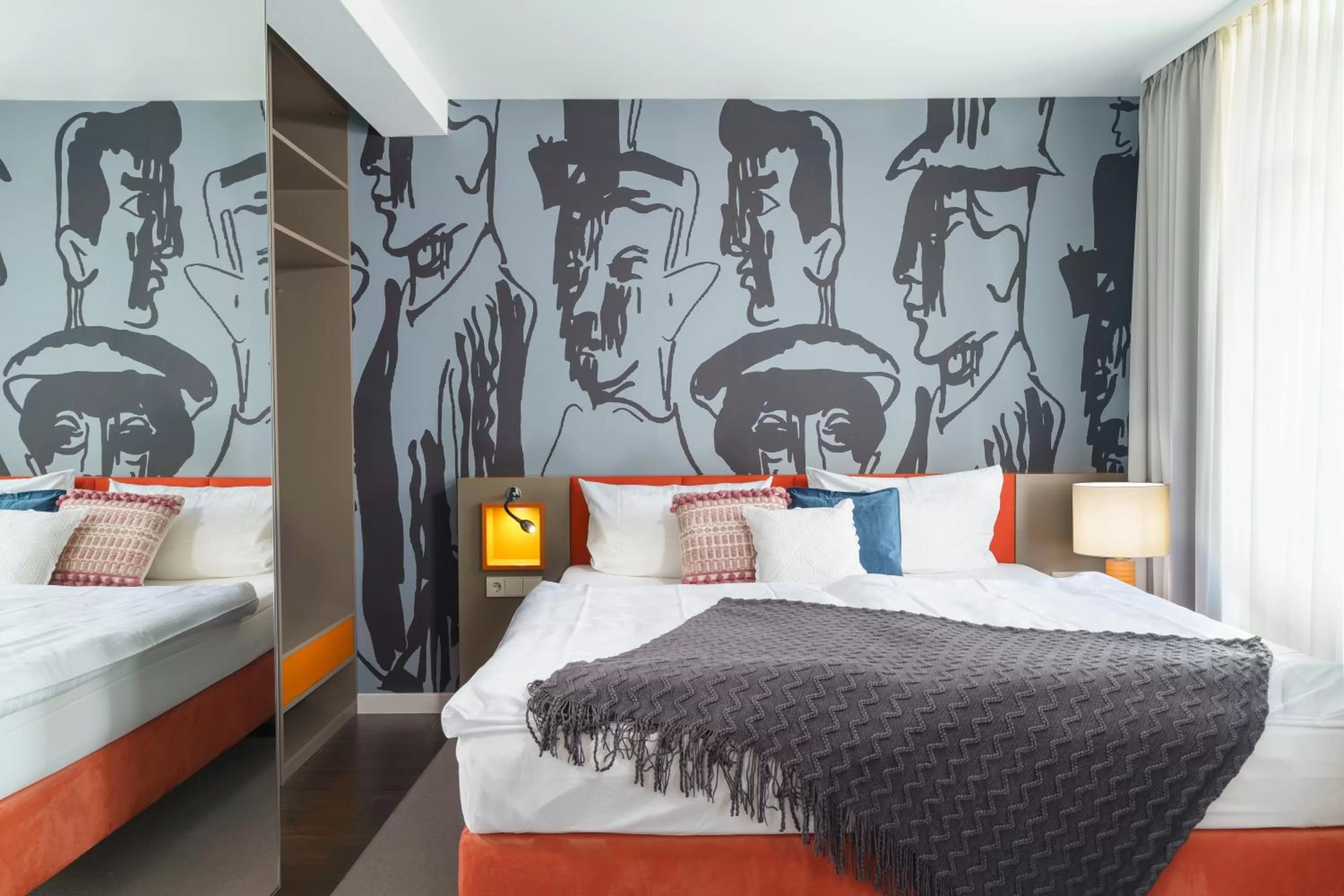 Bed in Tante ALMA's Bonner Hotel