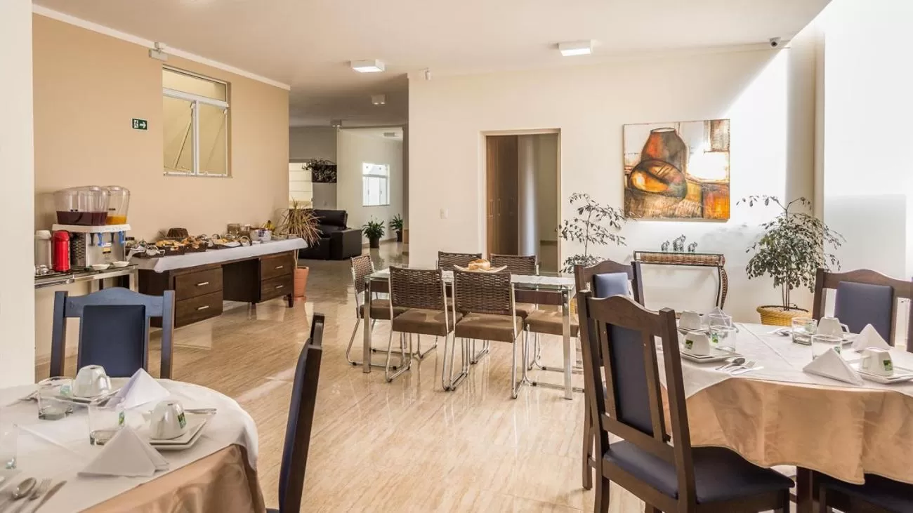 Communal lounge/ TV room, Restaurant/Places to Eat in Pousada Serra Nascente do Sol