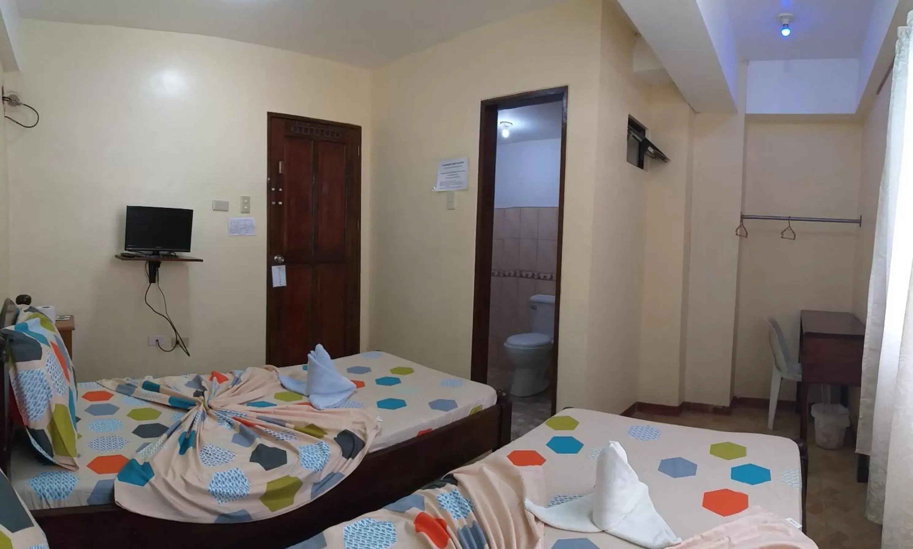 Twin Room with Bathroom in Divine Castle Travelers Inn Twin Room with Bathroom in Divine Castle Travelers Inn