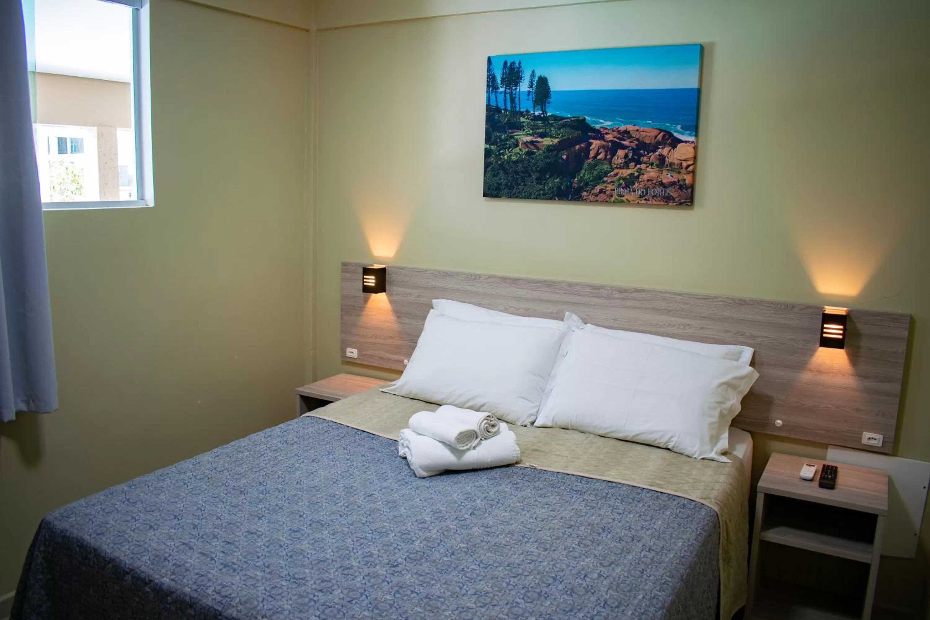 Bed in Pousada Tissiano