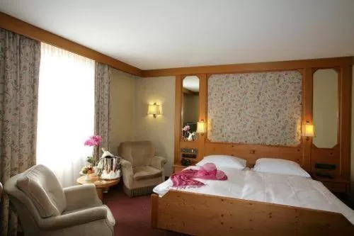 Bed in Hotel-Restaurant Arneggers Adler