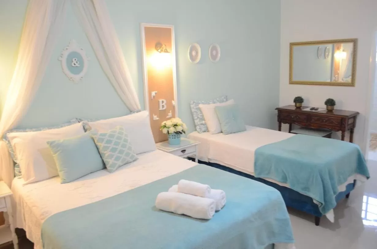 Bed in La Maison Brasiliana B&B