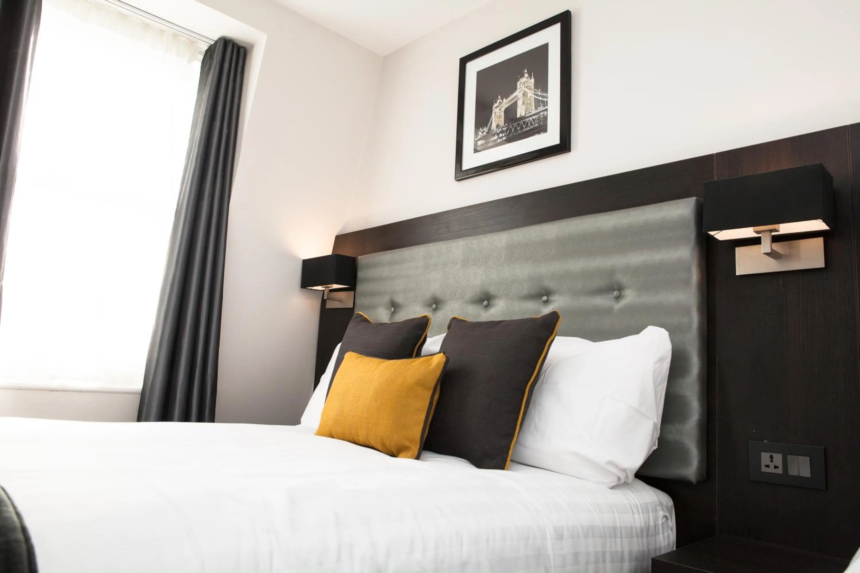 Photo of the whole room, Bed in The Tudor Inn Hotel