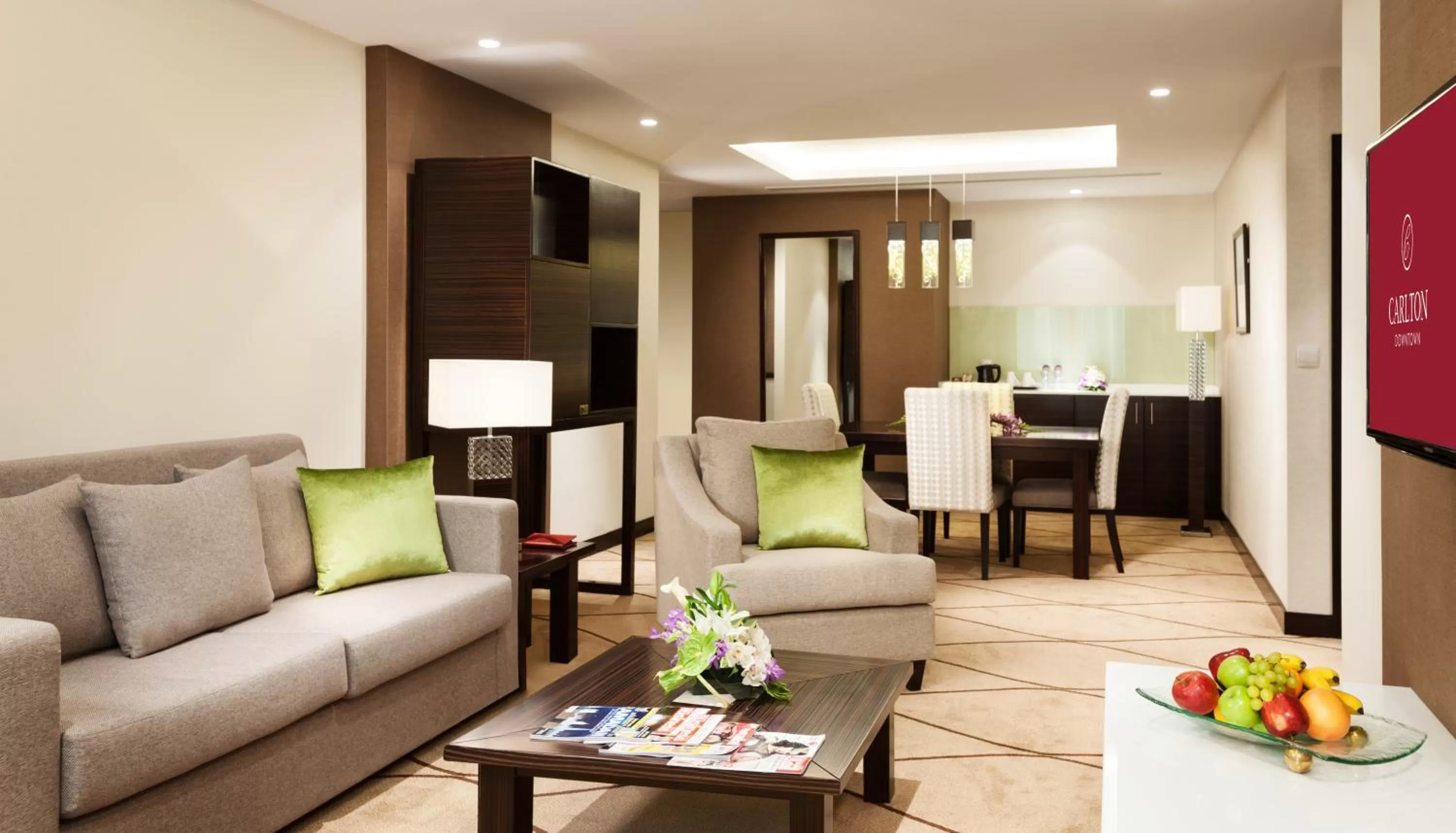 Living room in Carlton Downtown Hotel