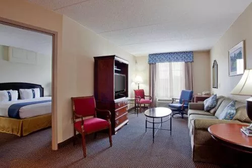 Living room, Bed in Holiday Inn Express & Suites Newport News by IHG