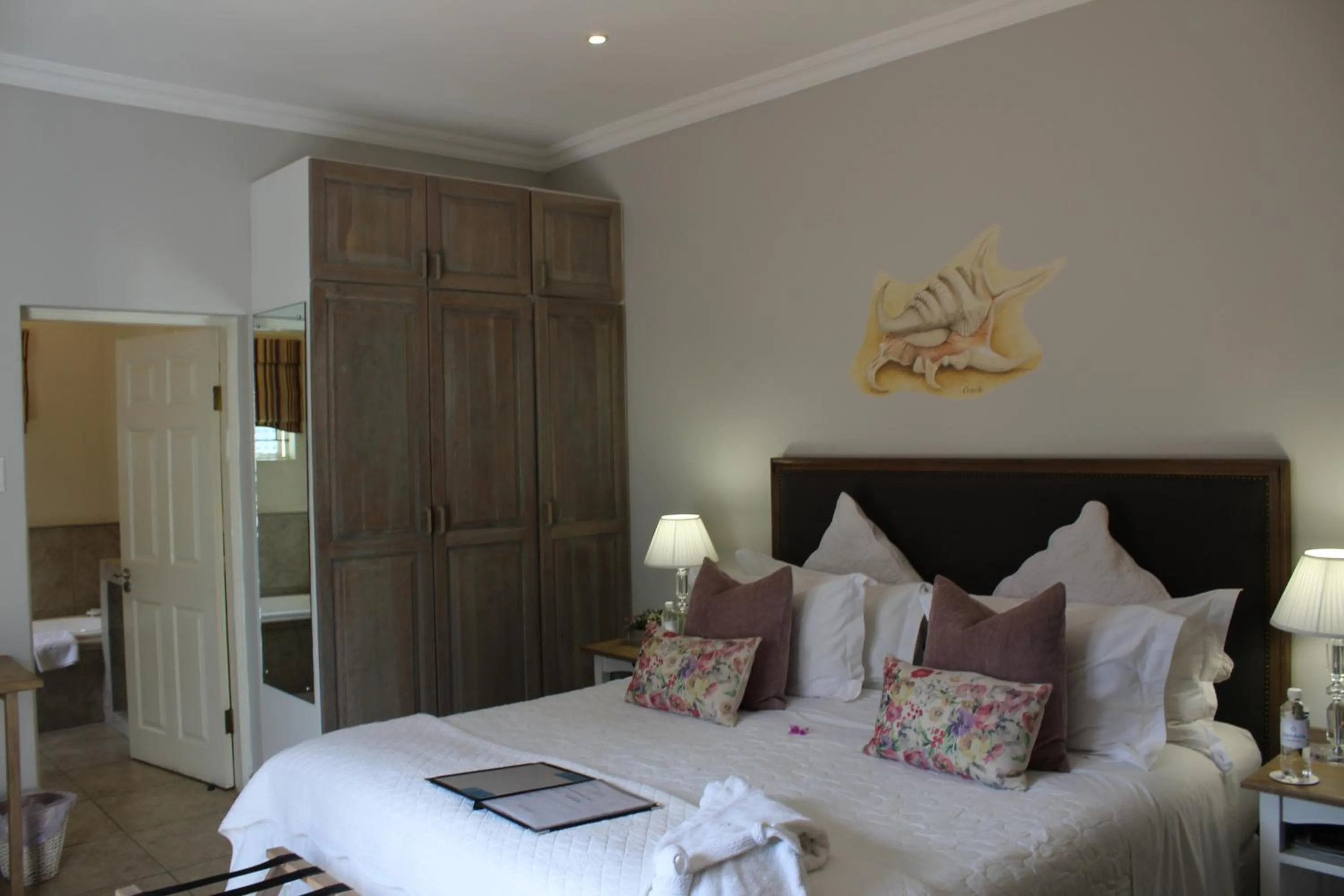 Bed in Sandals Guest House