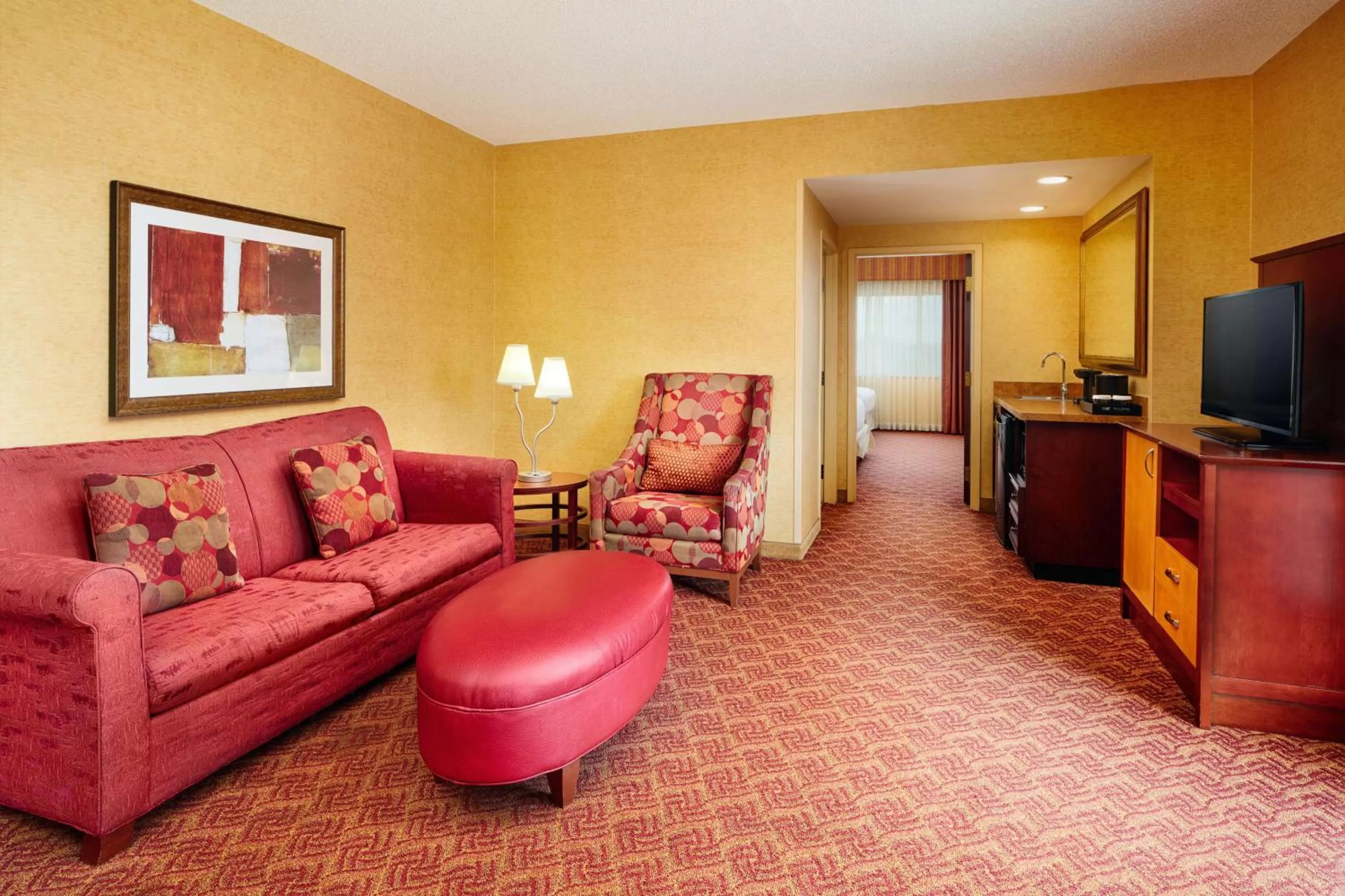Living room in Embassy Suites by Hilton Charlotte Concord Golf Resort & Spa