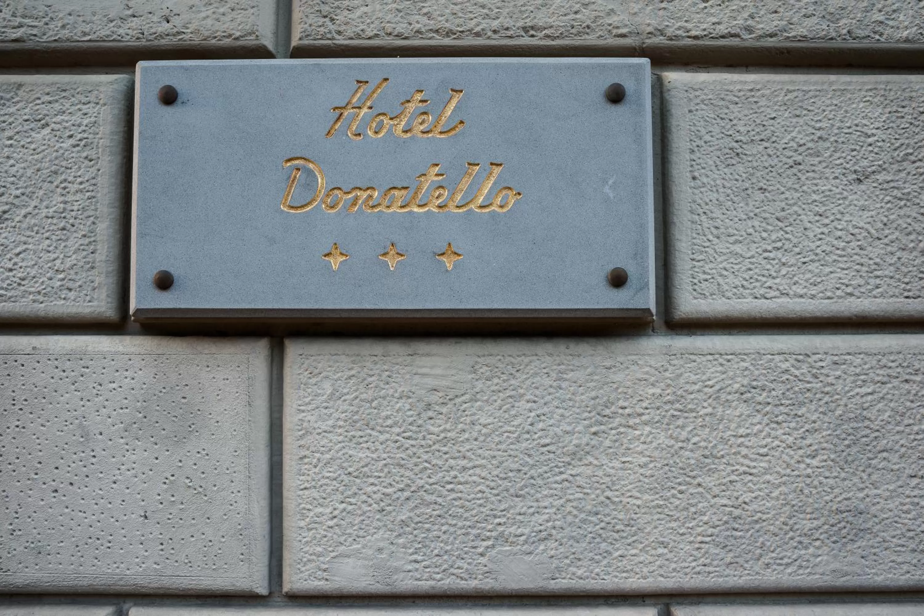 Property logo or sign in Hotel Donatello