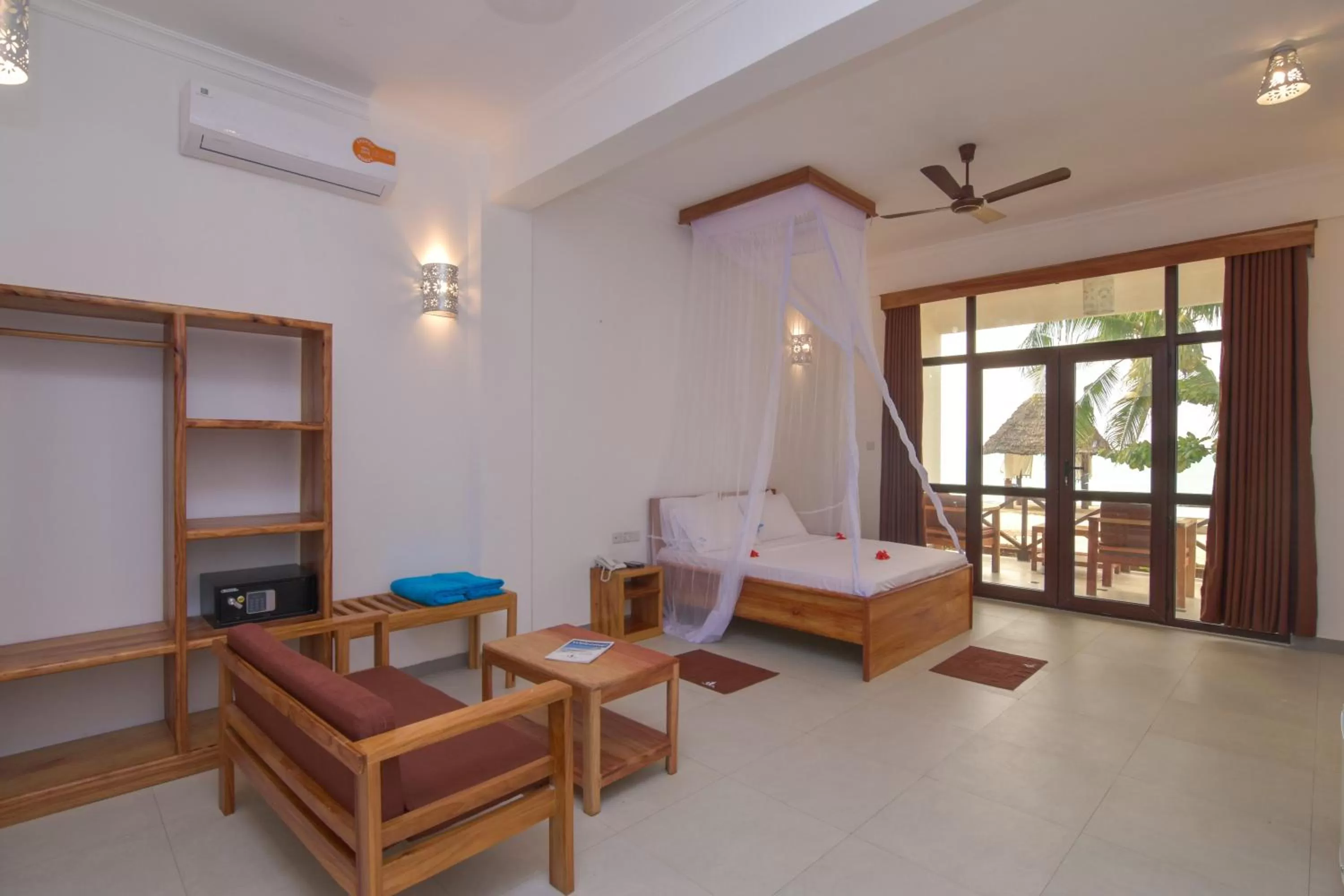 Living room, Bed in Mnarani Beach Cottages