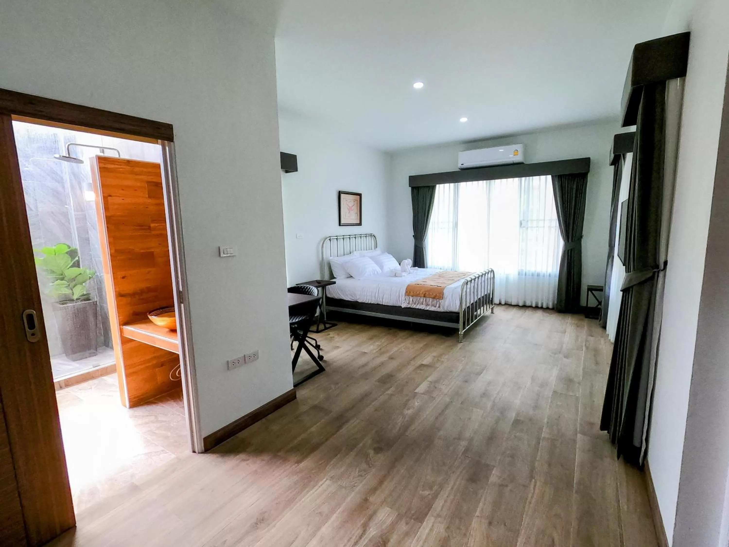 Bed in Isan Golf & Adventure Hotel