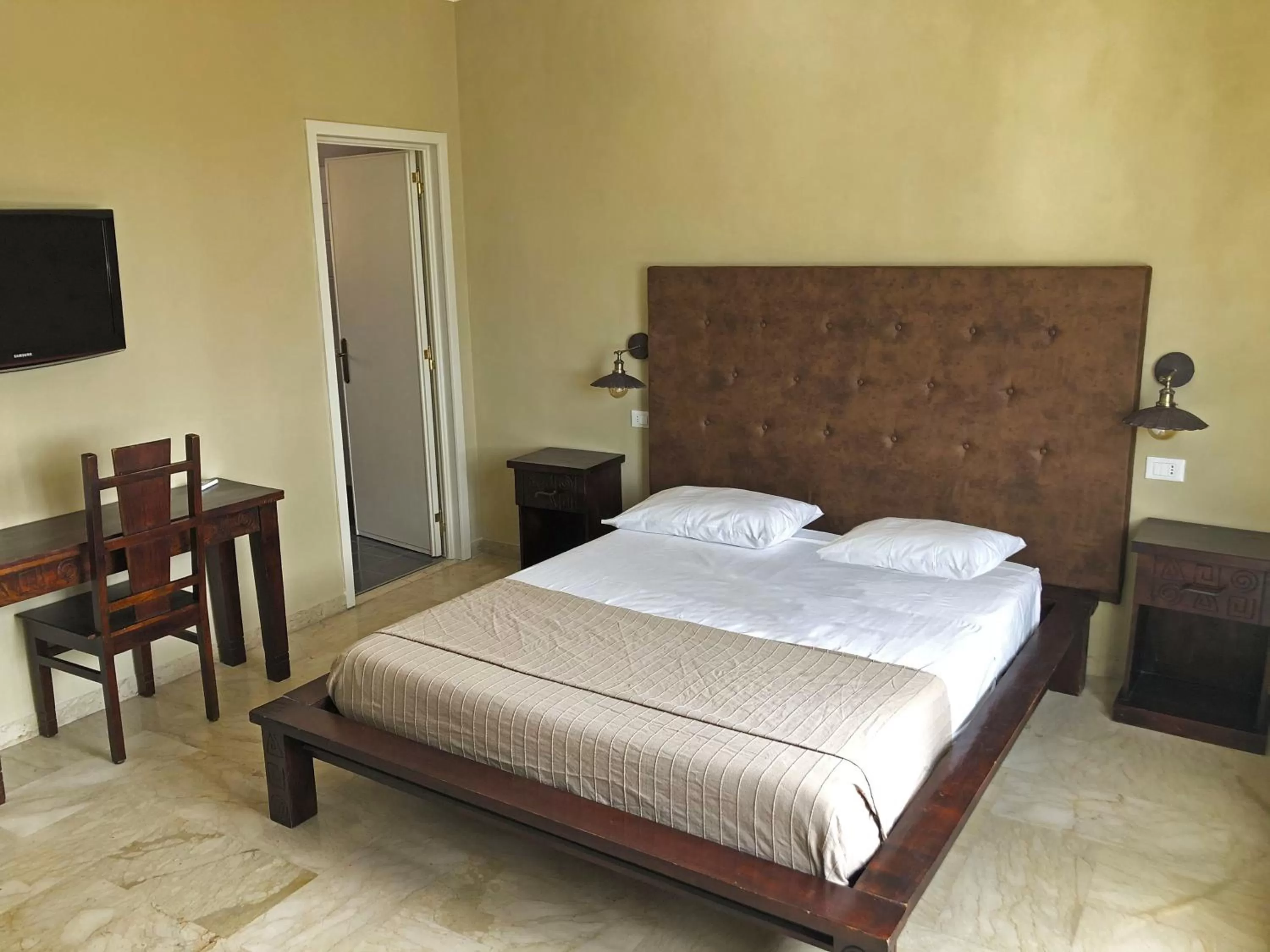 Bed in L'Attico di Piazza Mazzini Rooms