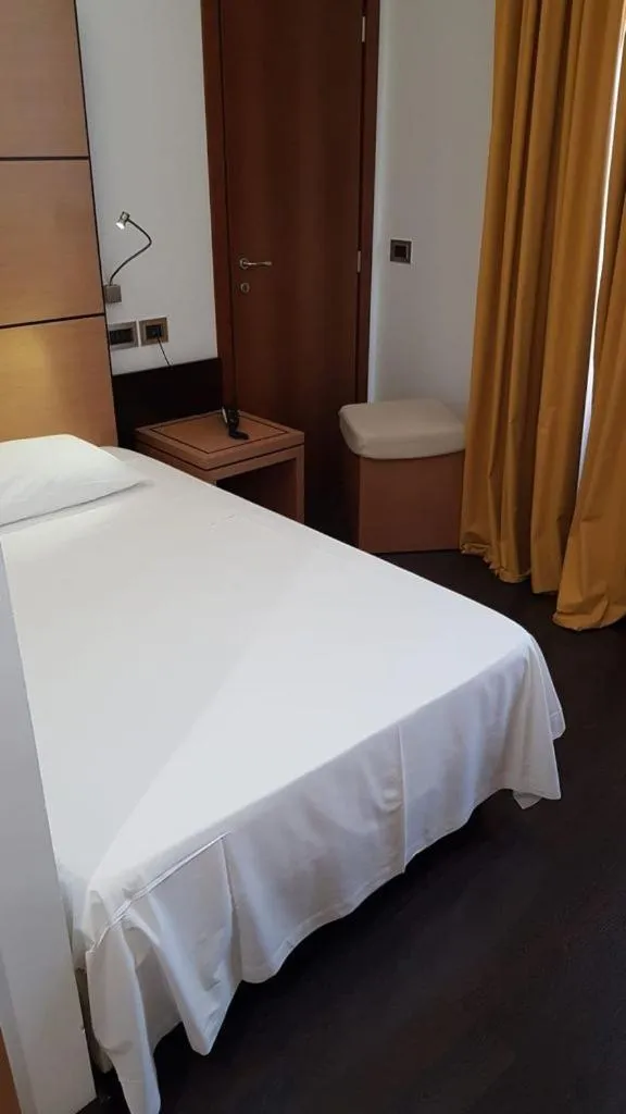 Bed in Hotel Cimarosa
