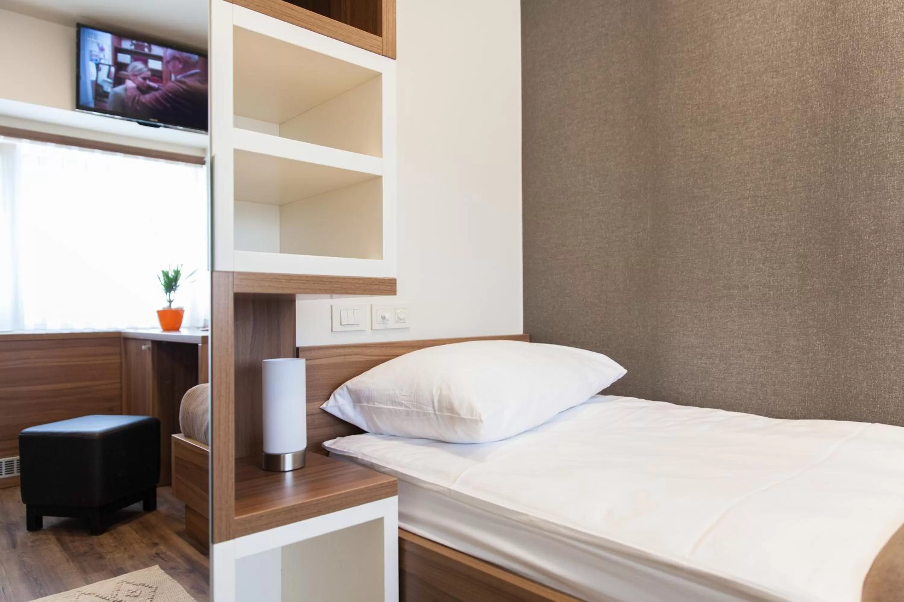 Bed in Hotel Pomaranča