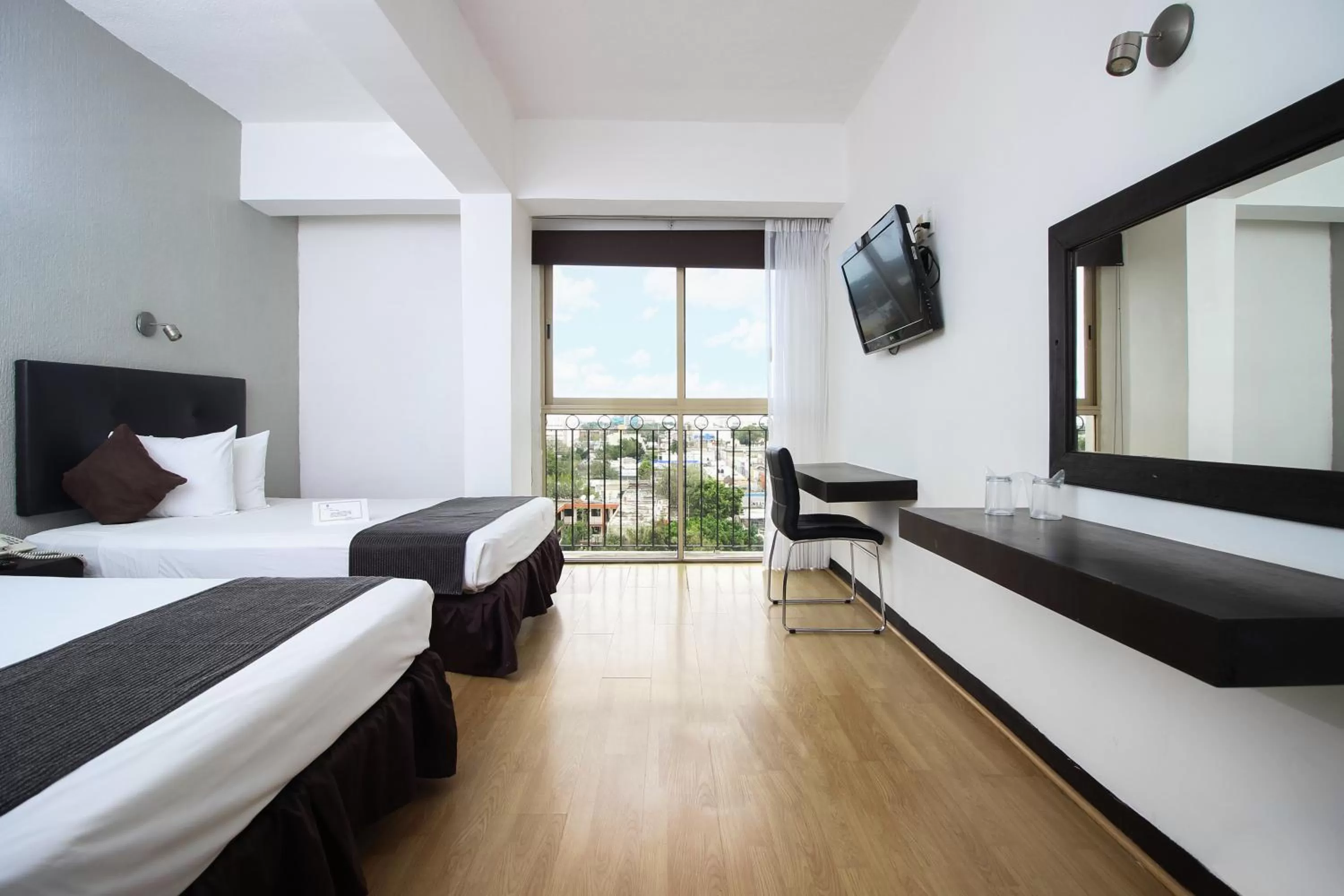 View (from property/room), Bed in Hotel Maya Yucatan