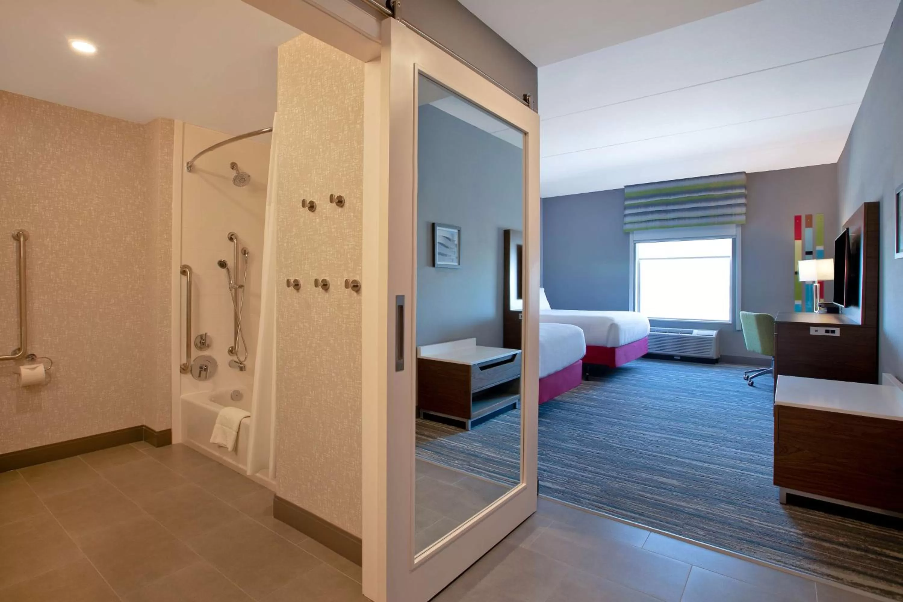 Bathroom, Bed in Hampton Inn & Suites Ottawa West, Ontario, Canada
