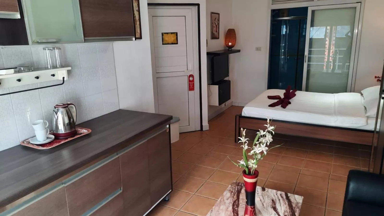 Photo of the whole room, Bed in Swiss Food Restaurant and room for rent