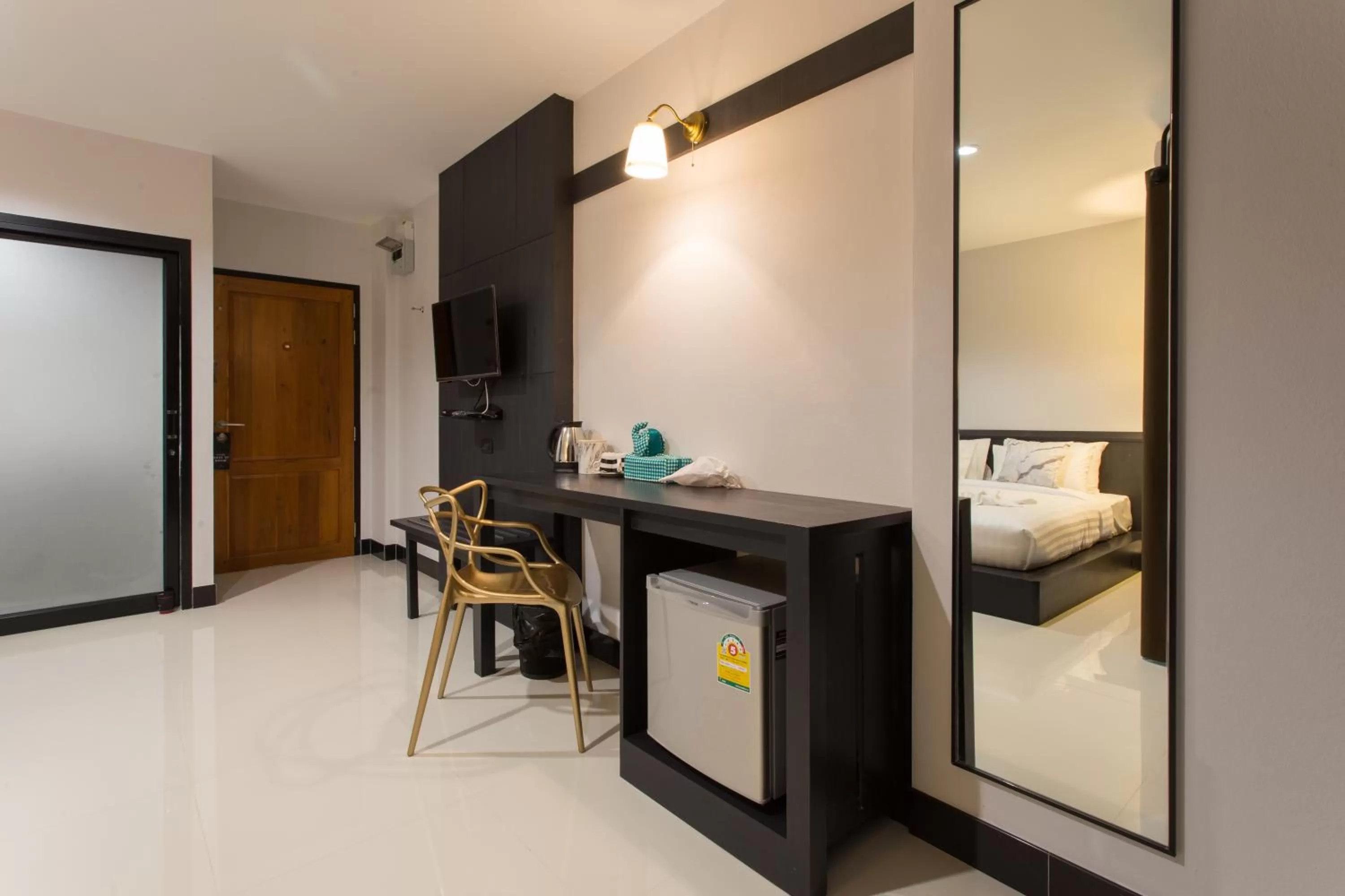 Seating area, Bed in Well Timed Hotel