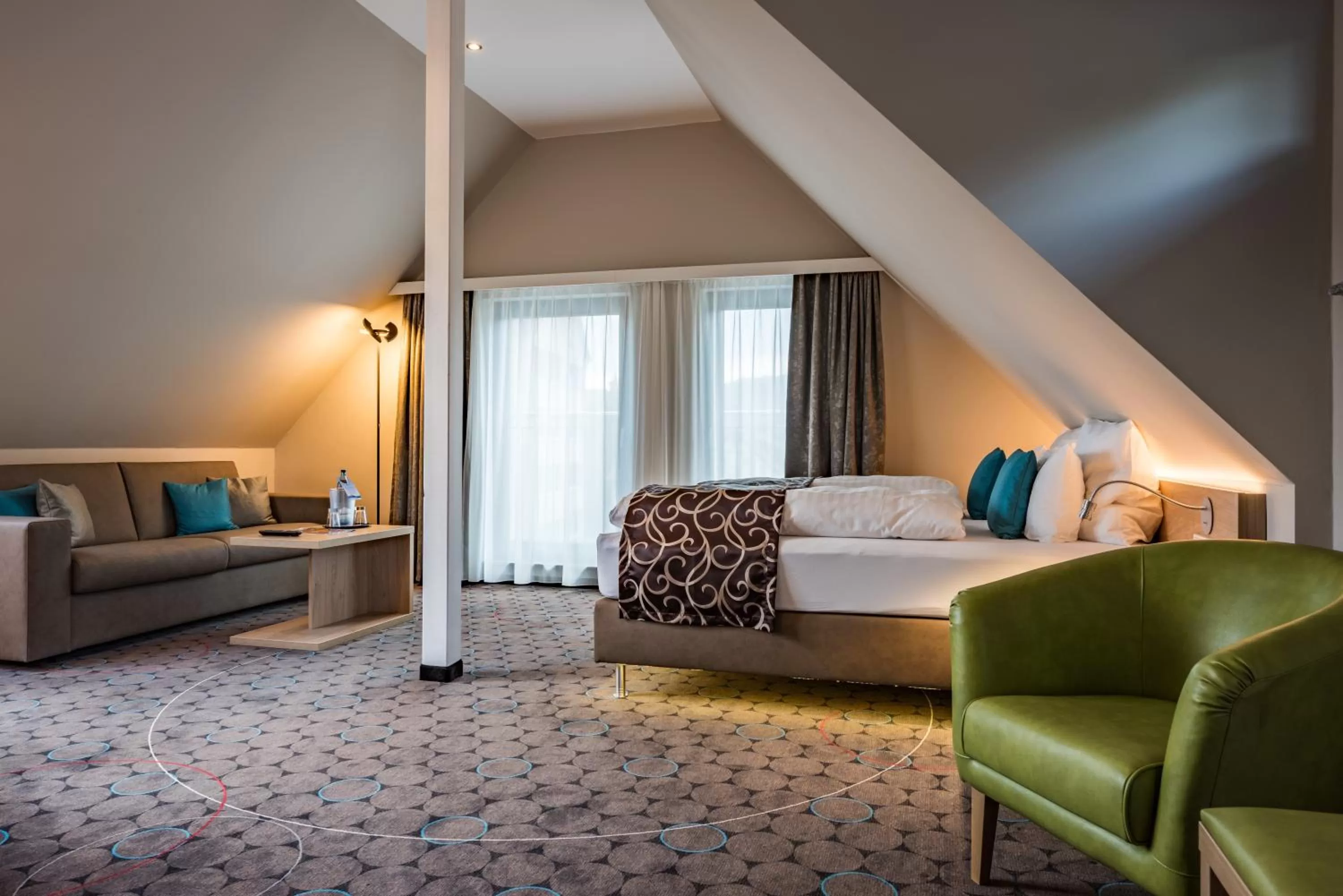 Photo of the whole room, Bed in AKZENT Hotel Villa Saxer