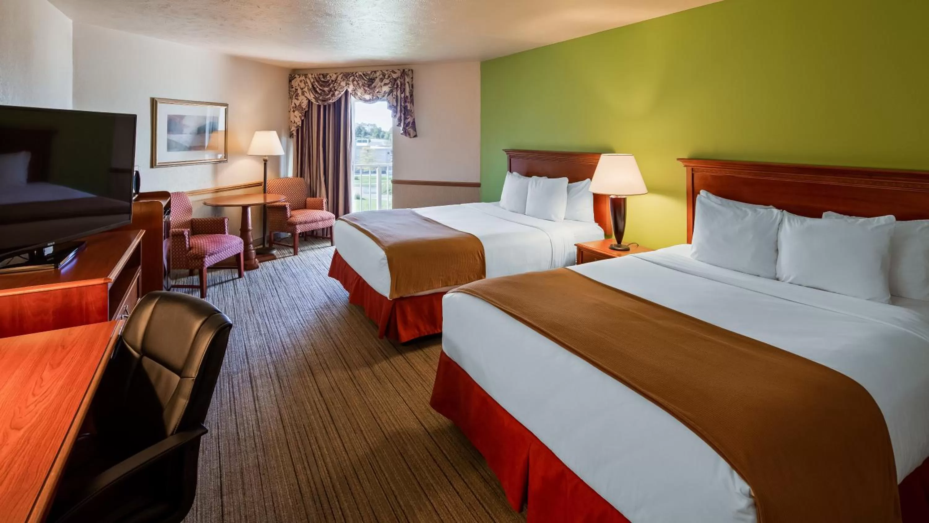 Bed in Apple Tree Inn; SureStay Collection by Best Western