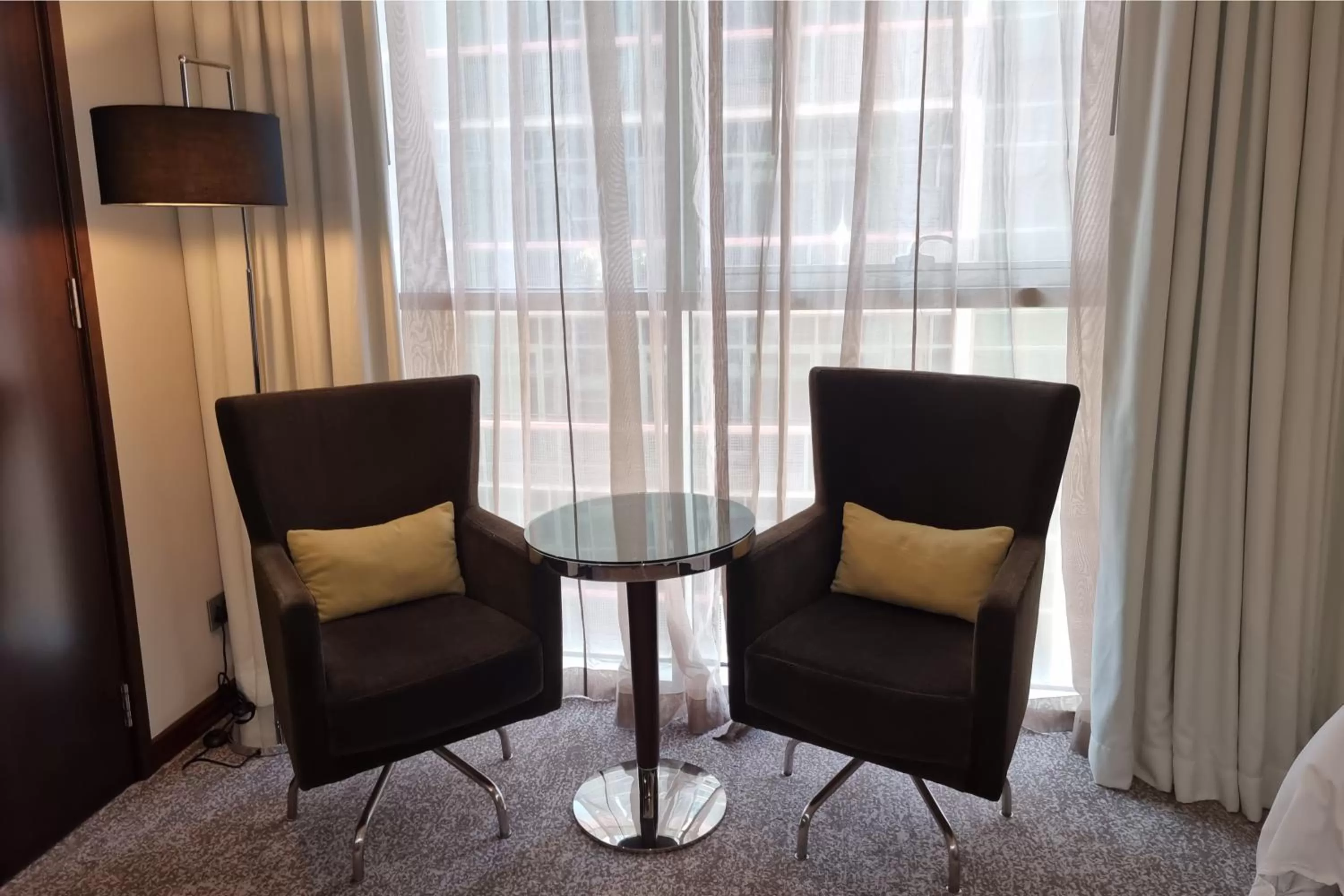 Seating area in Centro Al Manhal by Rotana