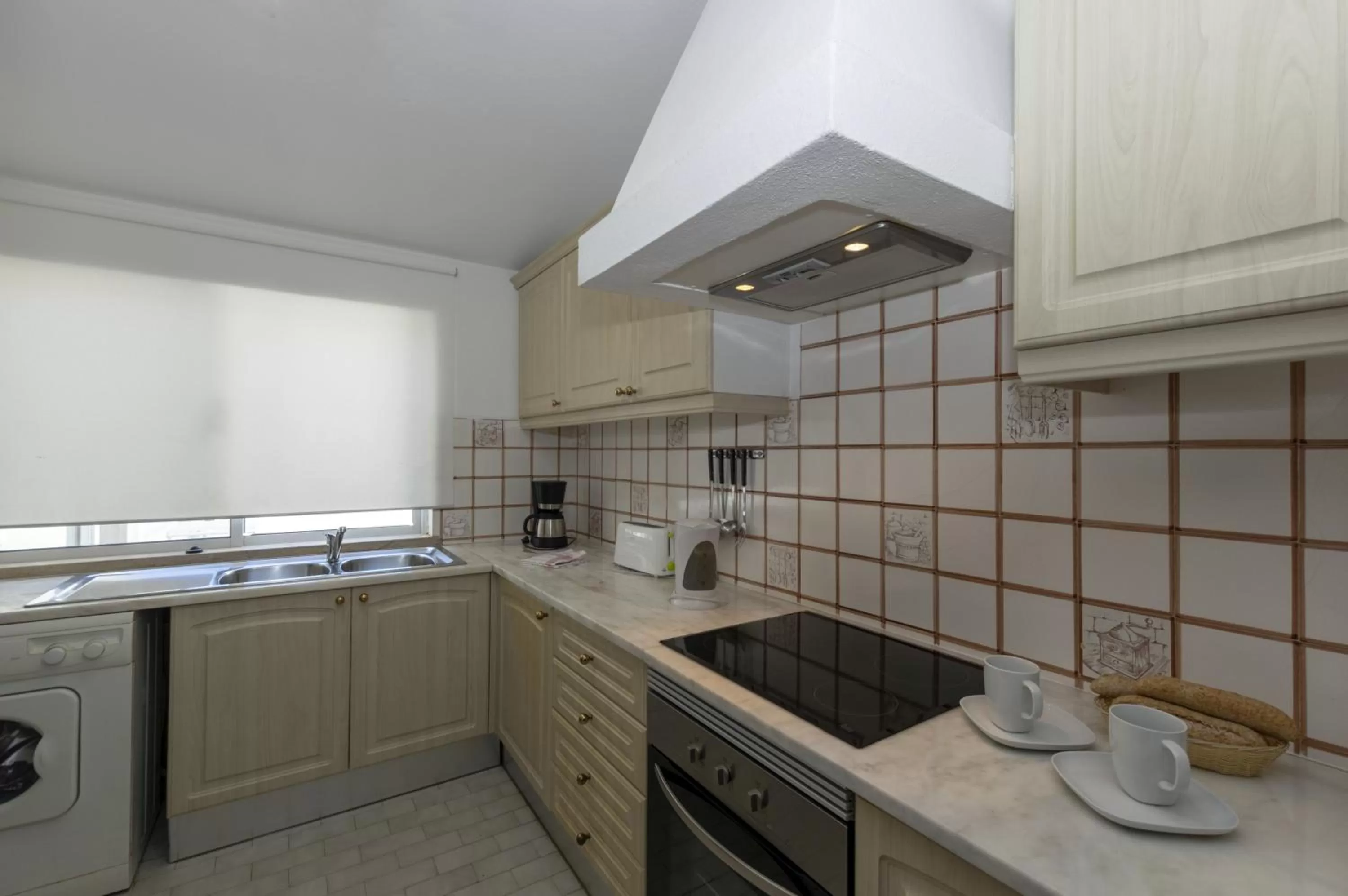 Kitchen or kitchenette in Rocha Brava Village Resort