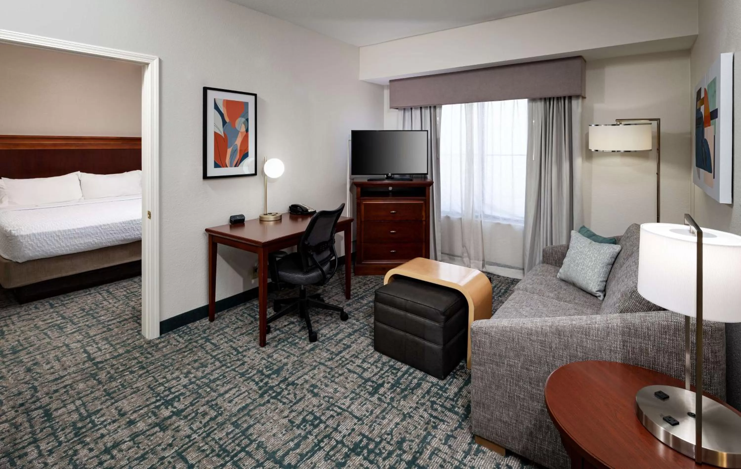 Living room, Bed in Homewood Suites by Hilton Jacksonville-South/St. Johns Ctr.