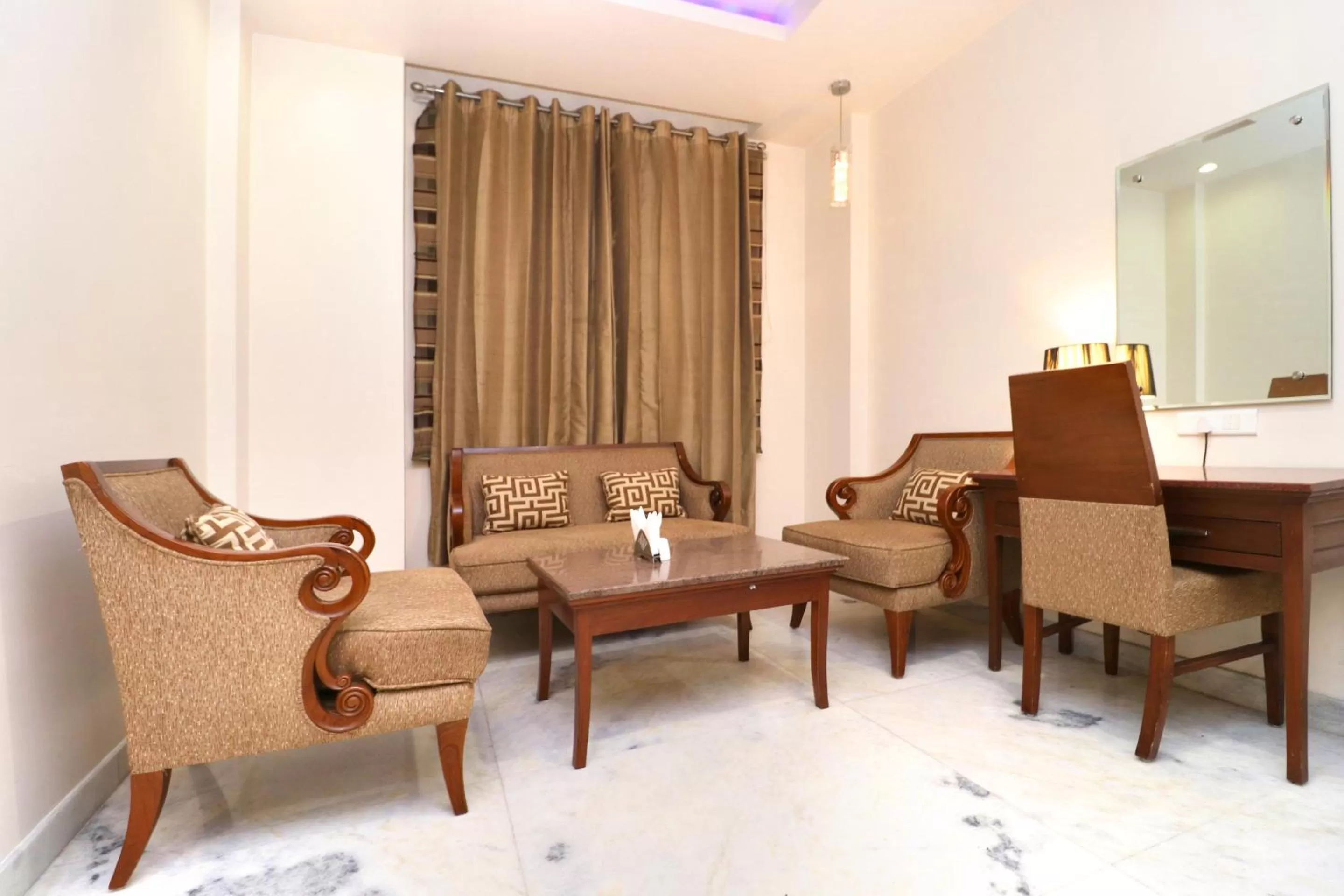 Seating area in Hotel Leela Grande