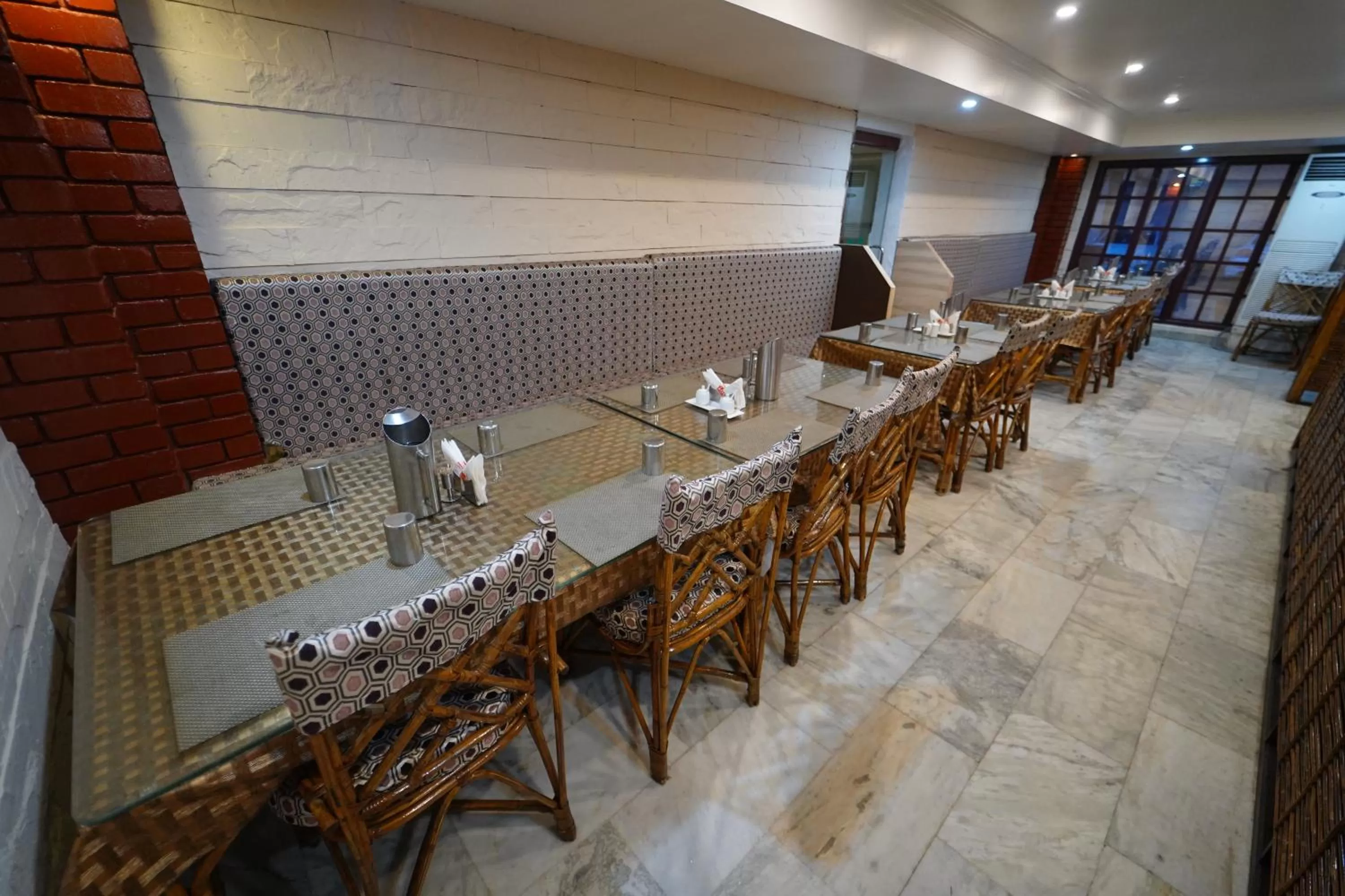 Restaurant/places to eat in Hotel Palmyra Grand Inn