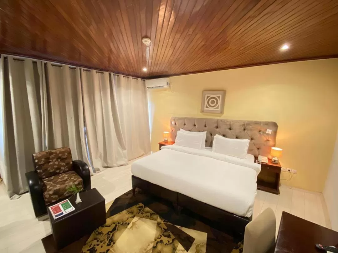 Bedroom in Fini Hotel Bobende