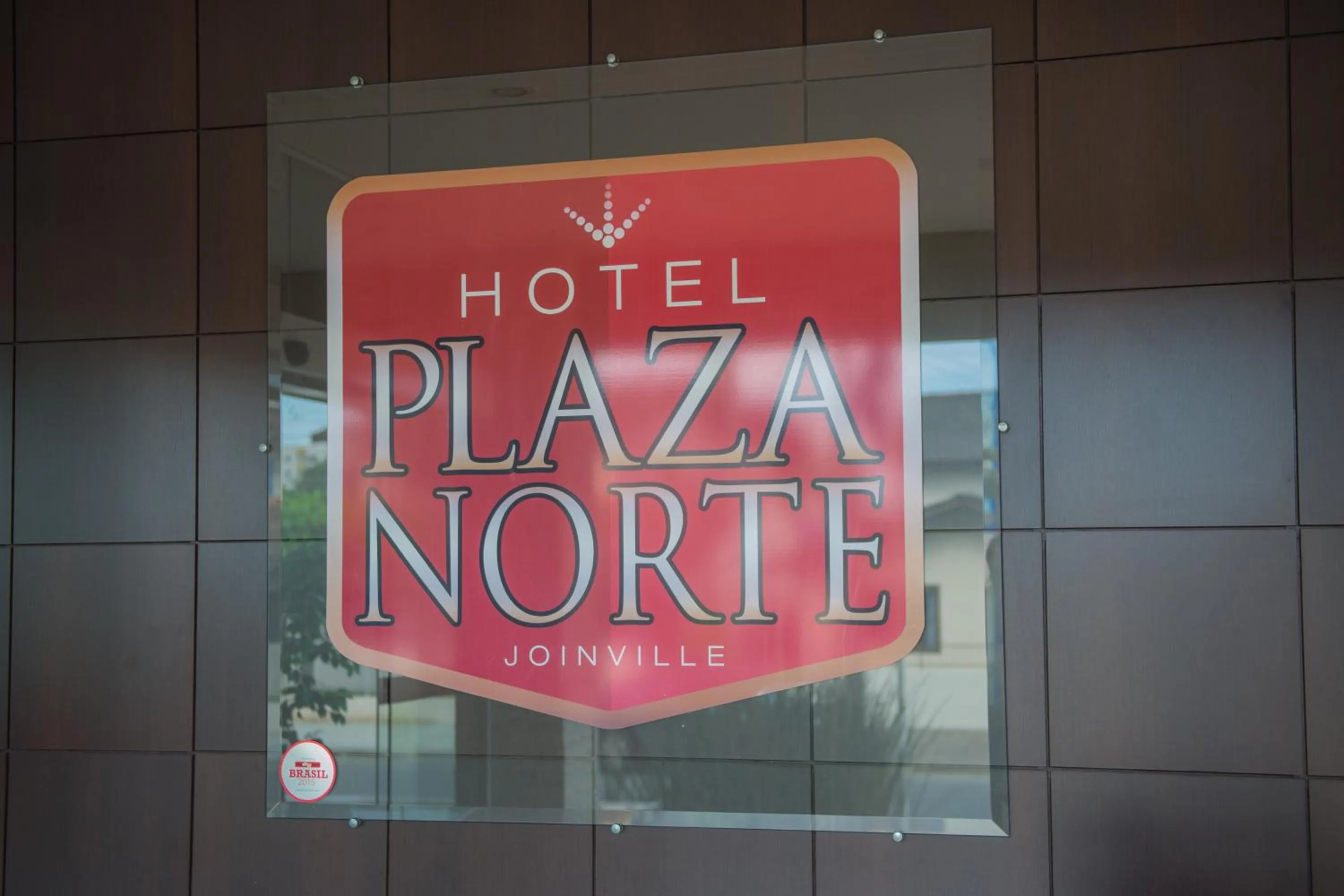 Property logo or sign in Hotel Plaza Norte