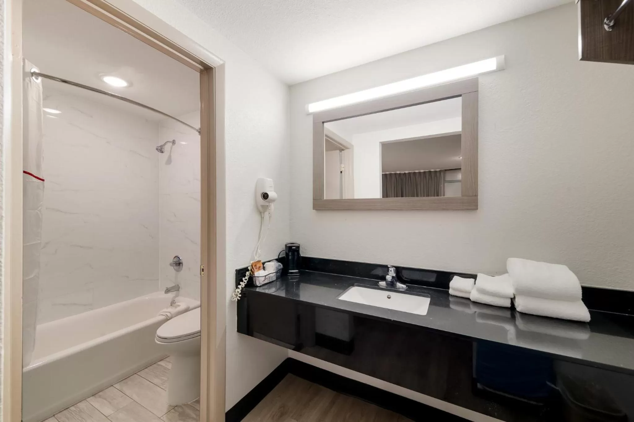 Bathroom in Red Roof Inn & Conference Center McKinney