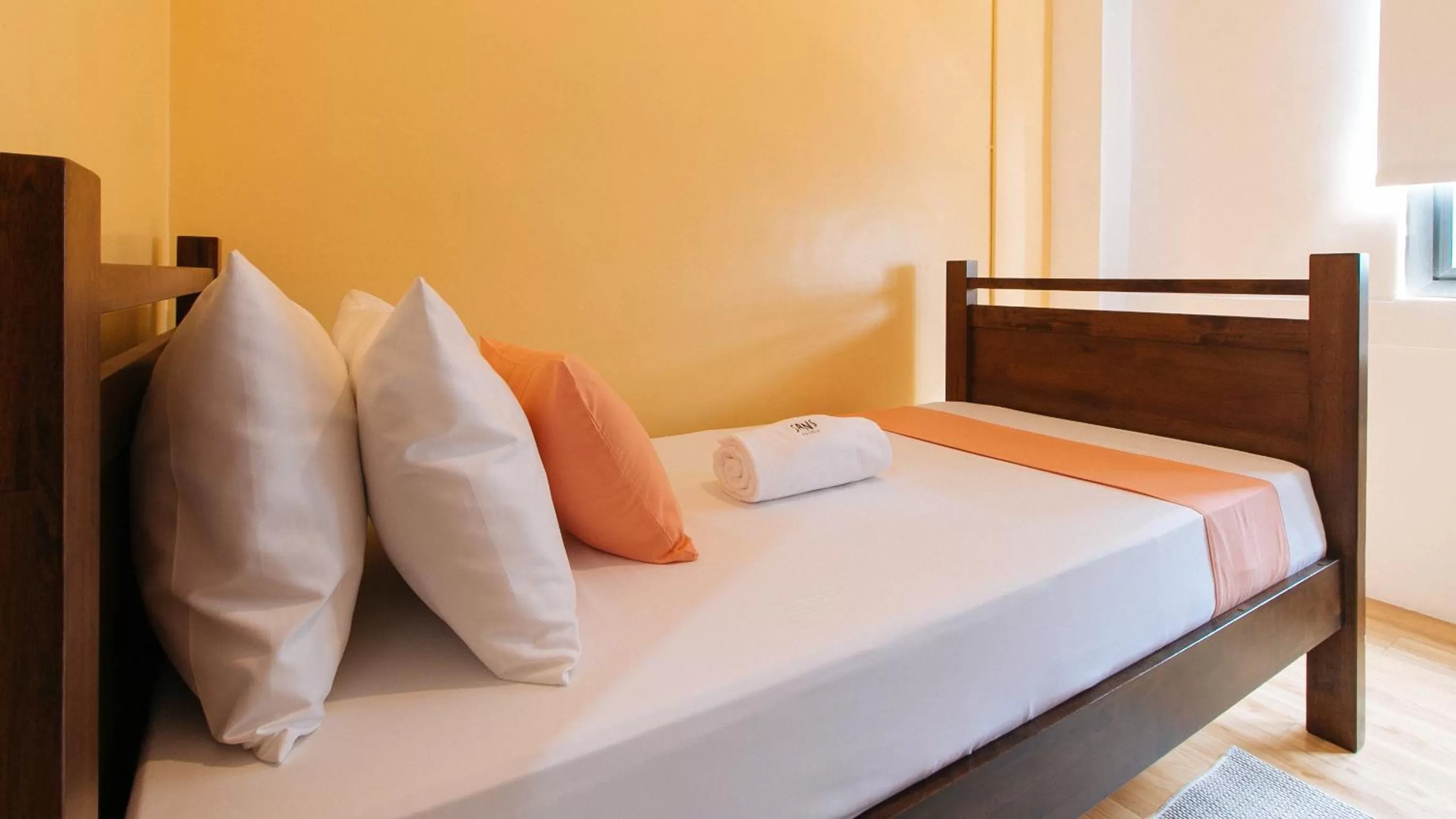 Bed in Sans Hotel Laperal Manila