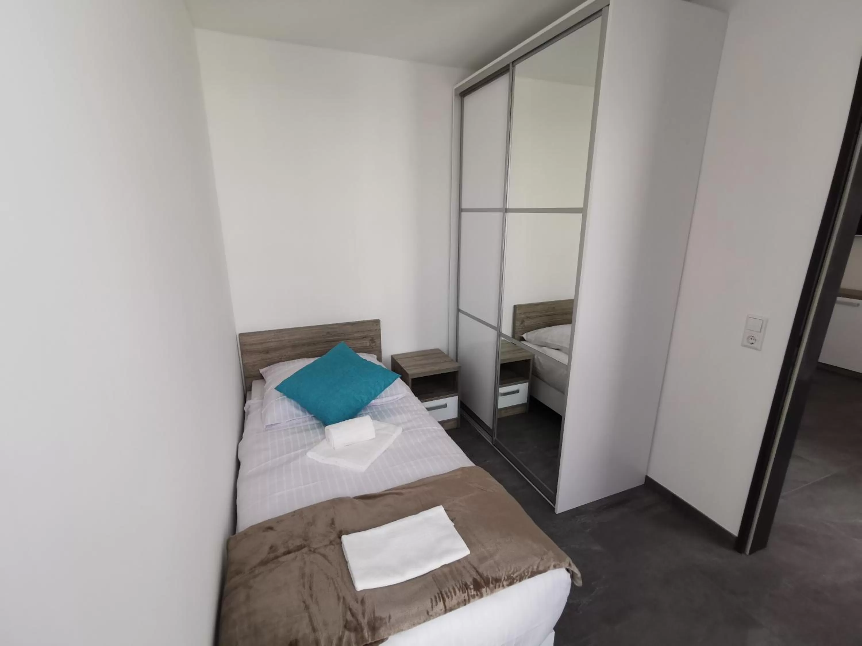 Bed in HP Apartments