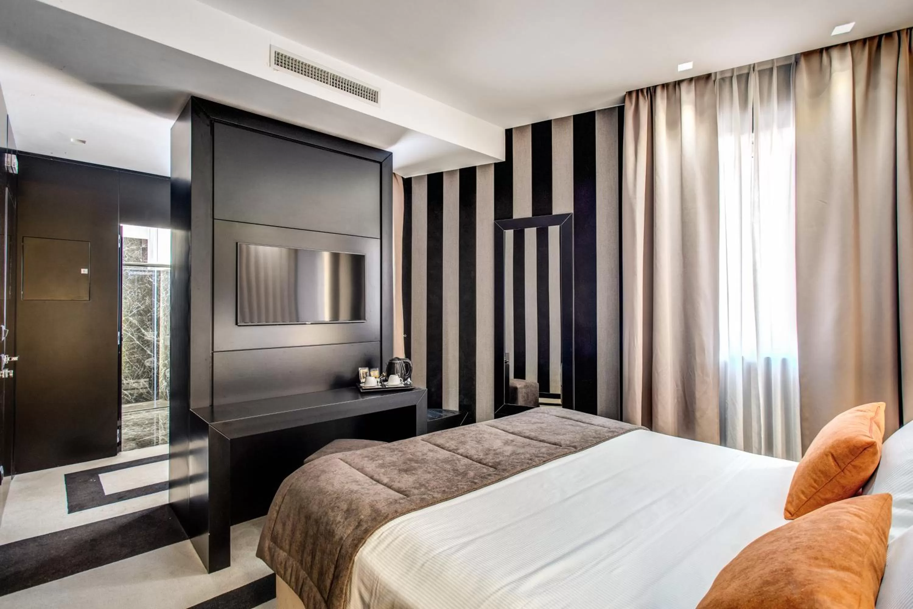 Bed in Doria Palace Boutique Hotel