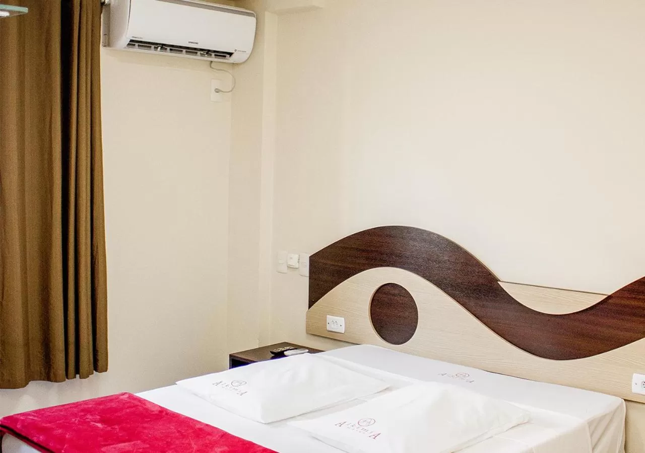 Bed in Alkimia Hotel